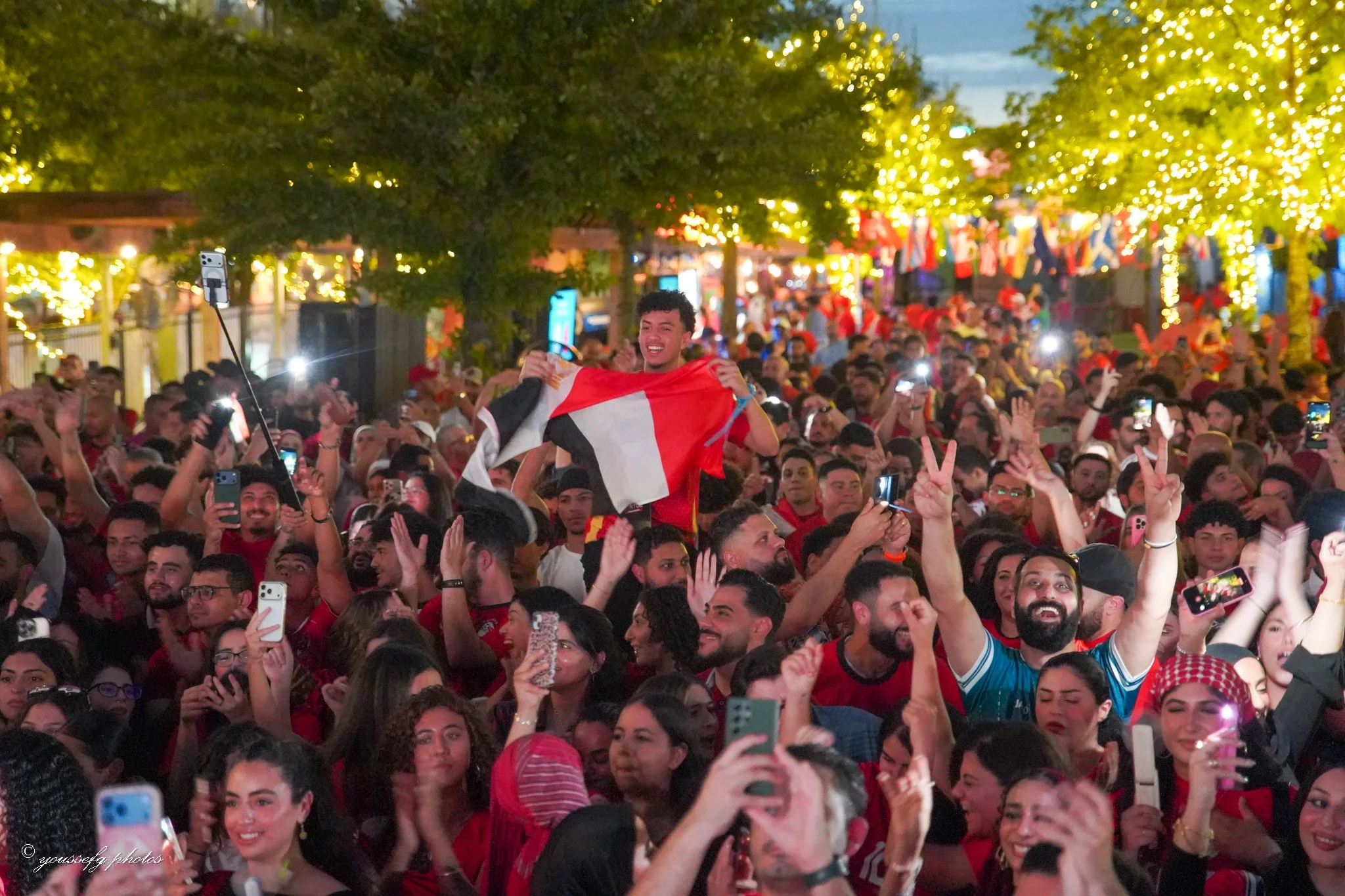 Egyptian fans celebrating at the Afroto World Cup pregame concert in Dallas–Fort Worth, hosted by Egypt DFW with live Egyptian music, culture, and community celebrations.