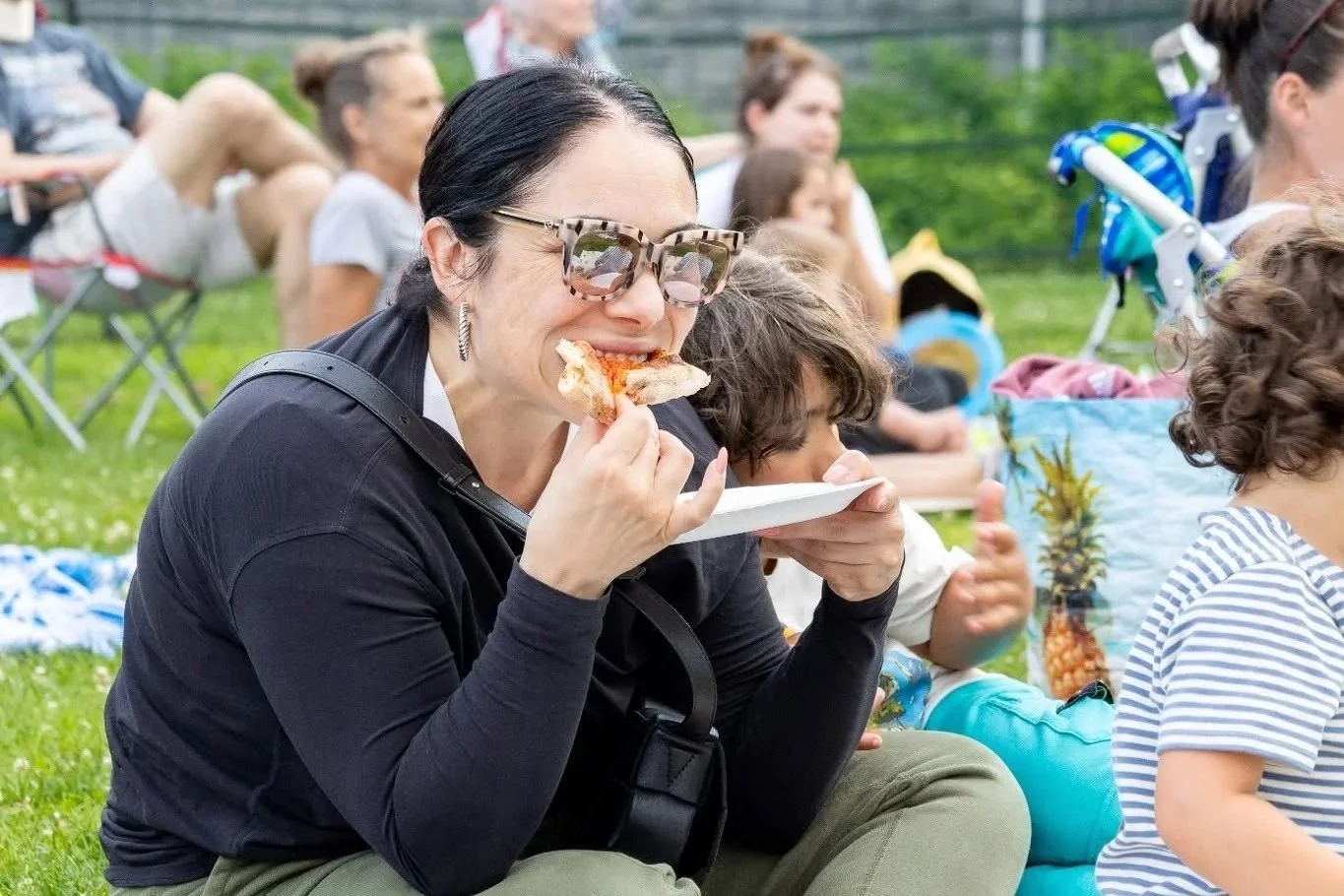 Downtown Milford summer events: Outdoor movie night featuring local residents on blankets. Every wednesday in july summer outdoor movies in downtown milford organized by the Downtown Milford Business Association.