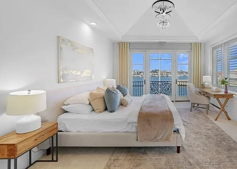 Coastal Modern primary bedroom staging in Huntington Beach for a real estate house listing for sale.
