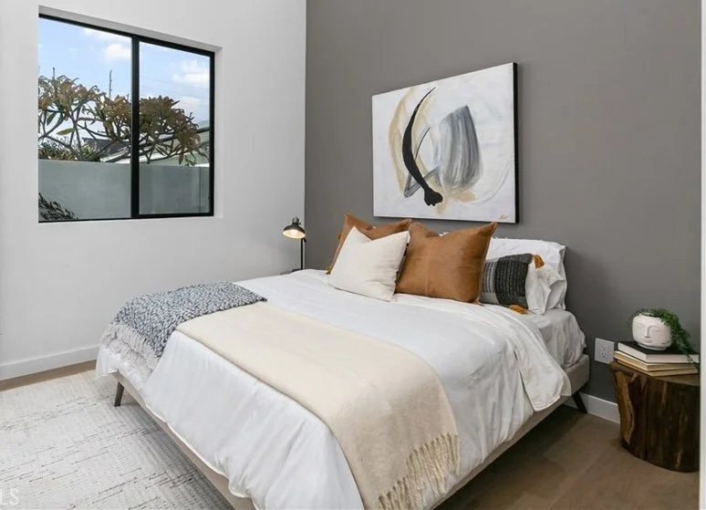 Modern staging for a bedroom in a home for sale in Huntington Beach, CA