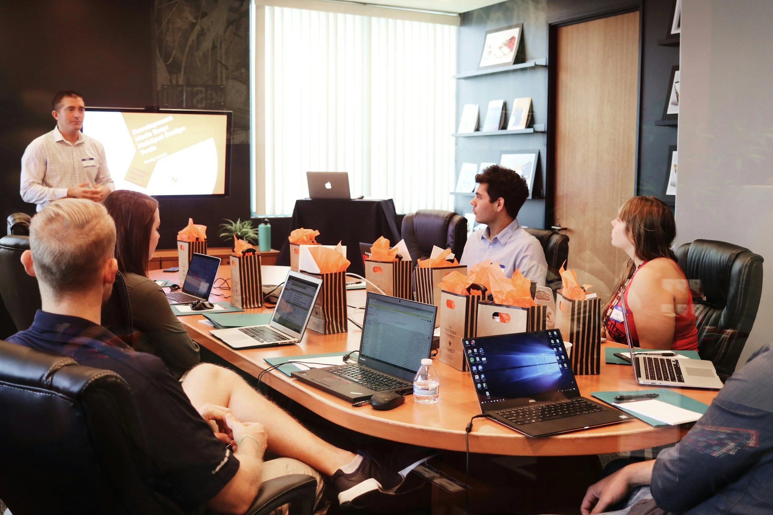 Coworkers around conference table