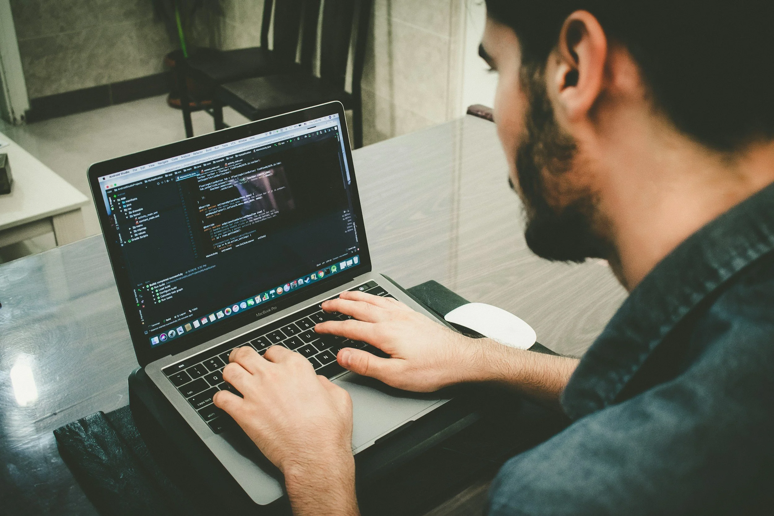 Bearded man on laptop