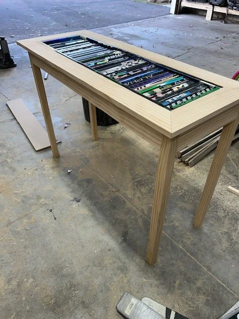 Custom request for a couch table with her sons sticks