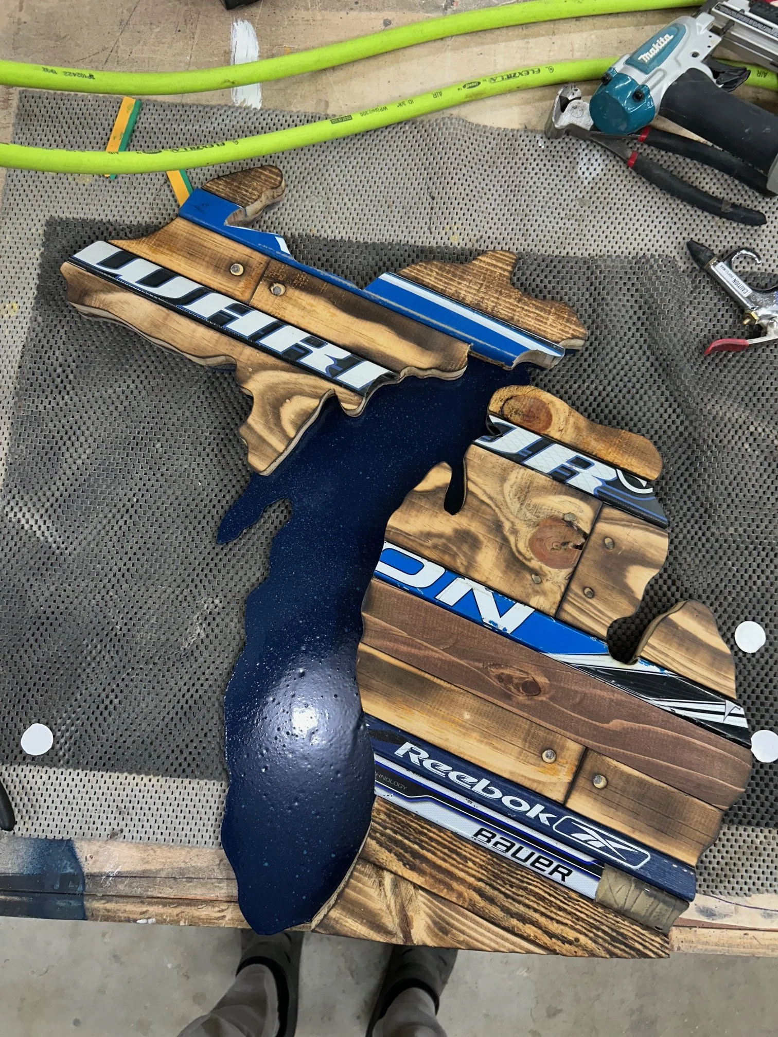 This is a custom board created for a Michigan fan