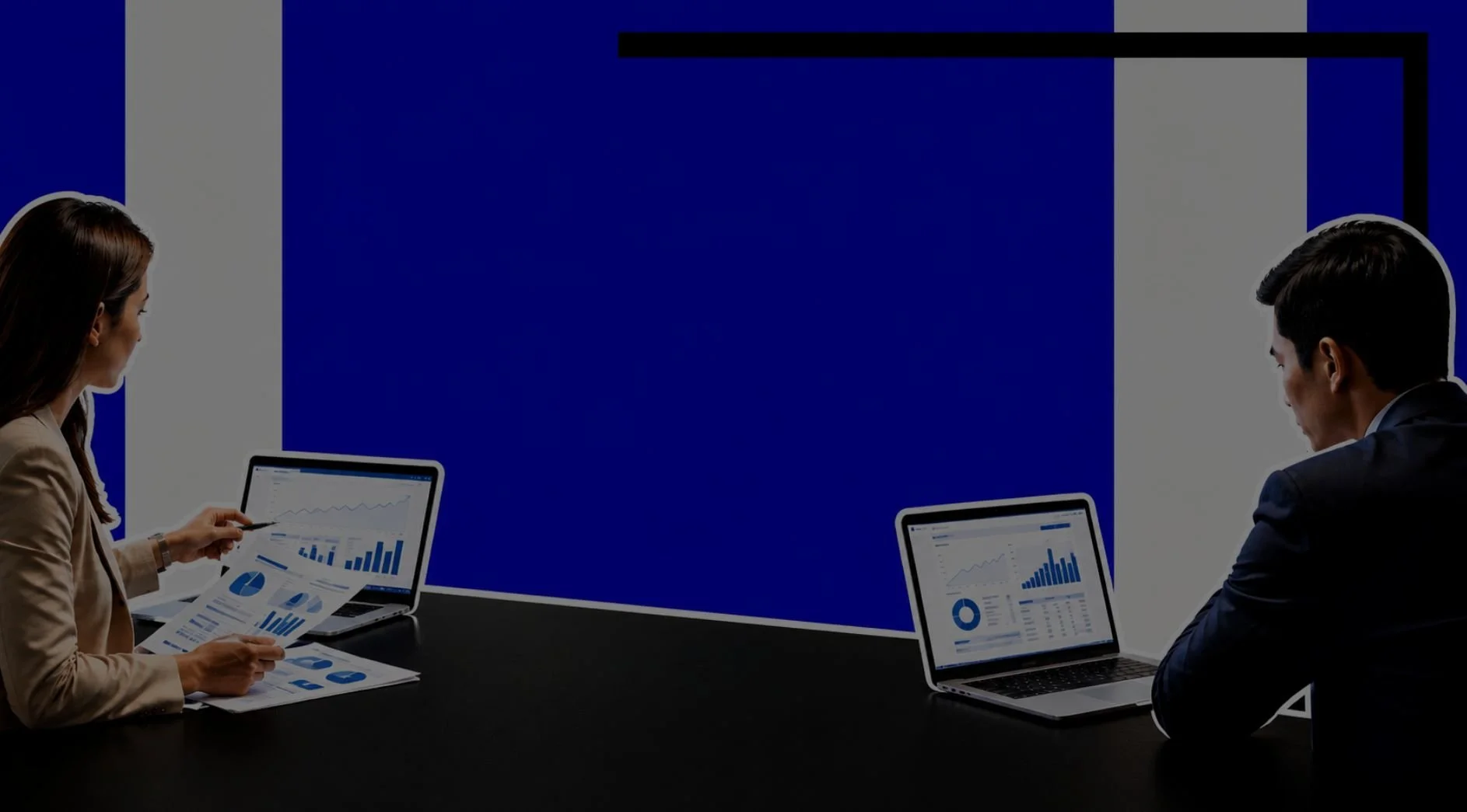 An image of two workers in an office
