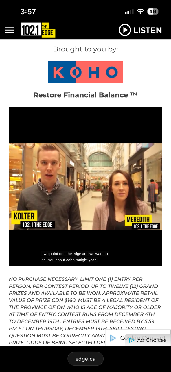 Screenshot of a radio station website featuring a video with two people, Kolter and Meredith, inside a shopping mall.
