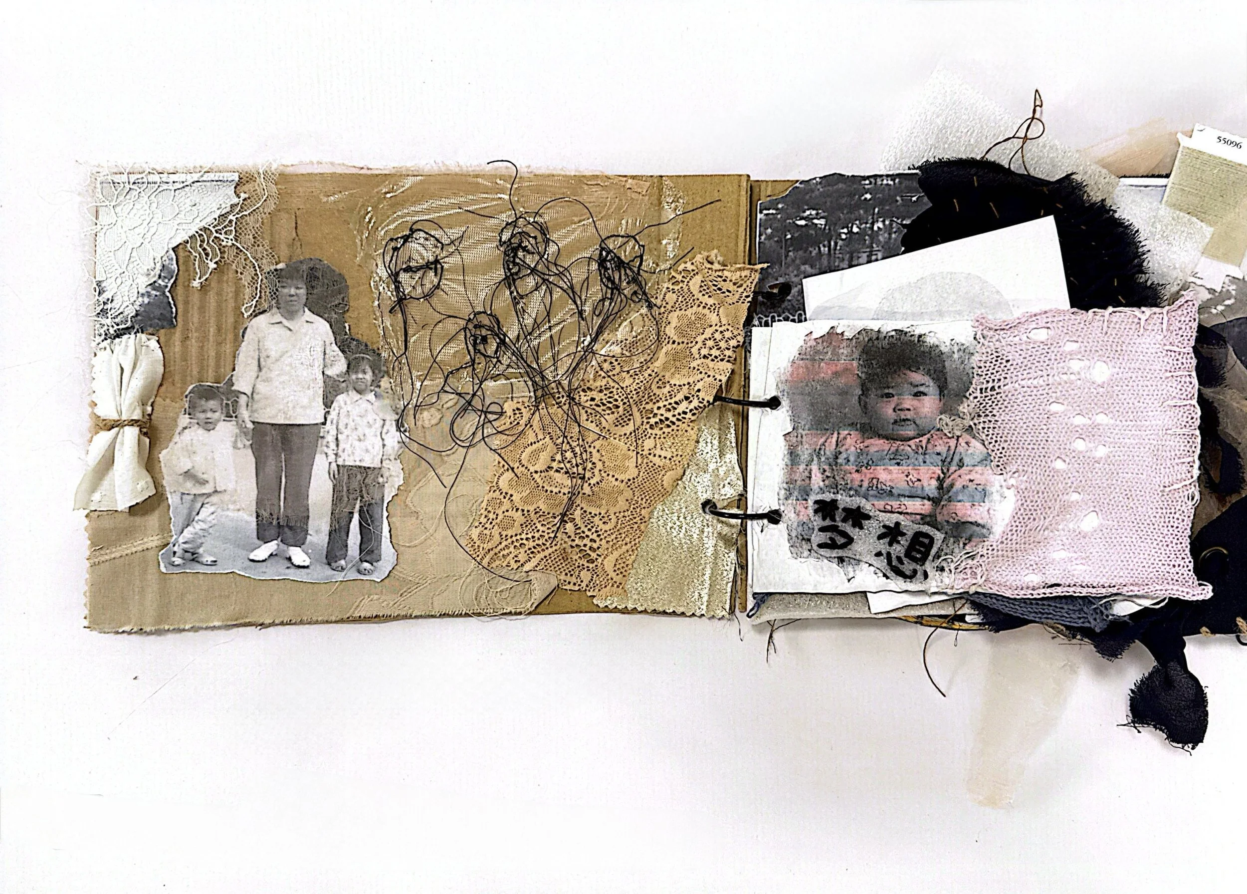 A collage of black-and-white photographs and doilies, including a photo of a woman and three children, with some embroidered and sewn fabric elements layered on top.