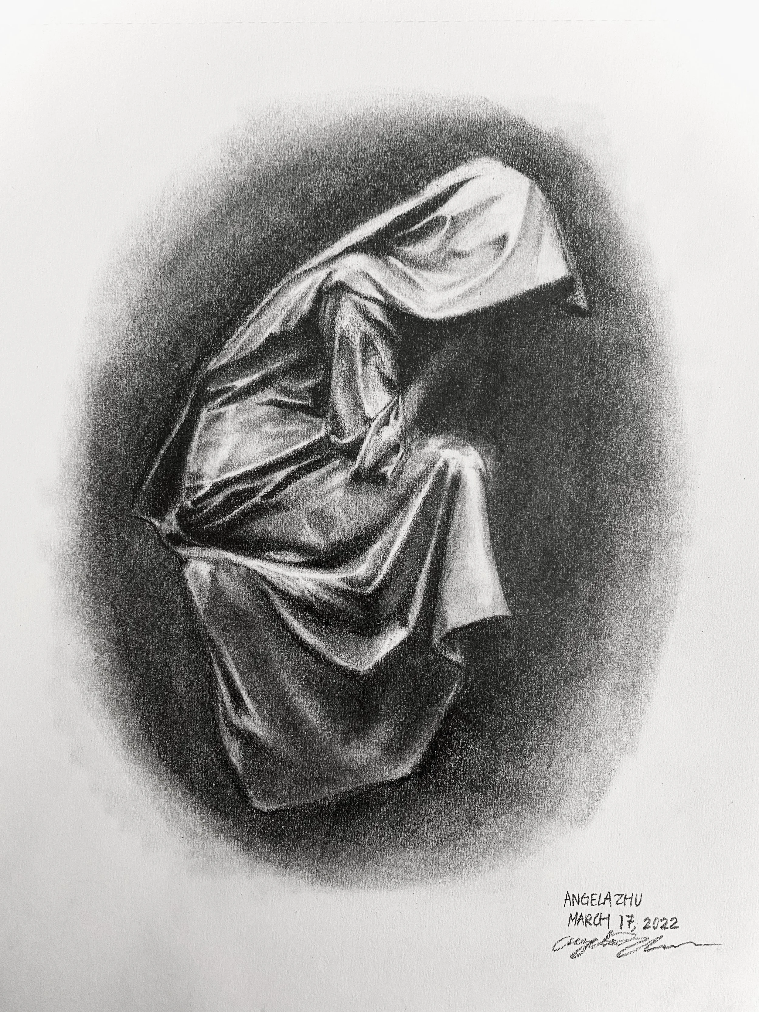 A detailed black and white drawing of a person in a hoodie with the hood pulled over their head. The person's face is mostly hidden. The drawing features shading and fine details, creating a realistic portrait style. Dated MARCH 18, 2022.