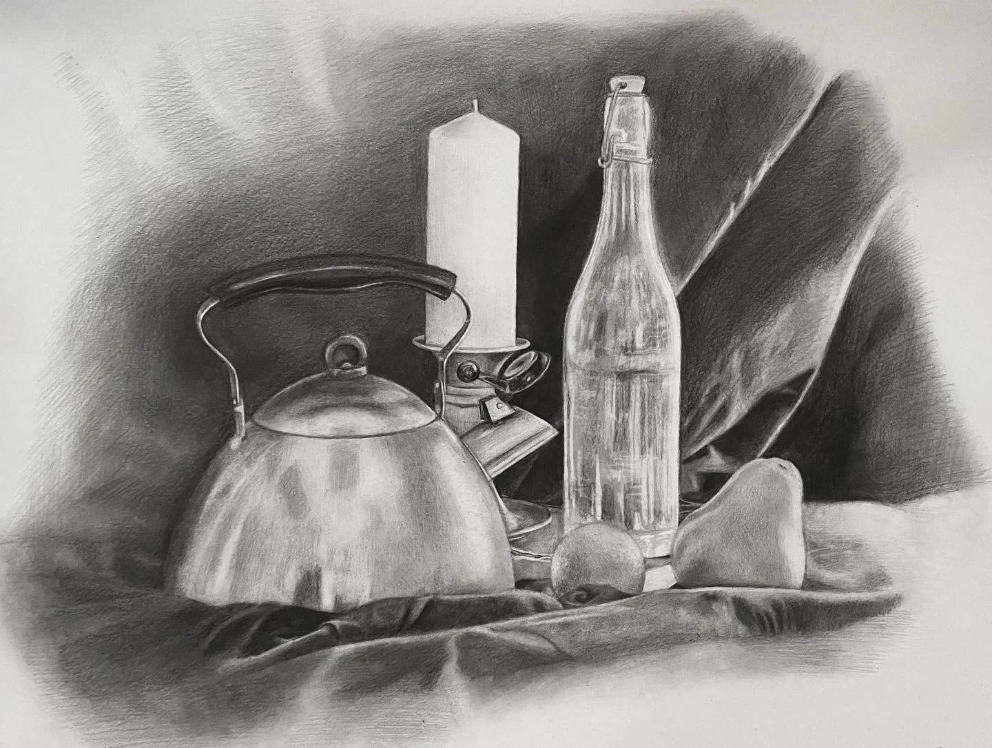 Black and white still life drawing of a kettle, candle, a glass bottle, a pear, an apple, arranged on a draped surface with a dark cloth background.