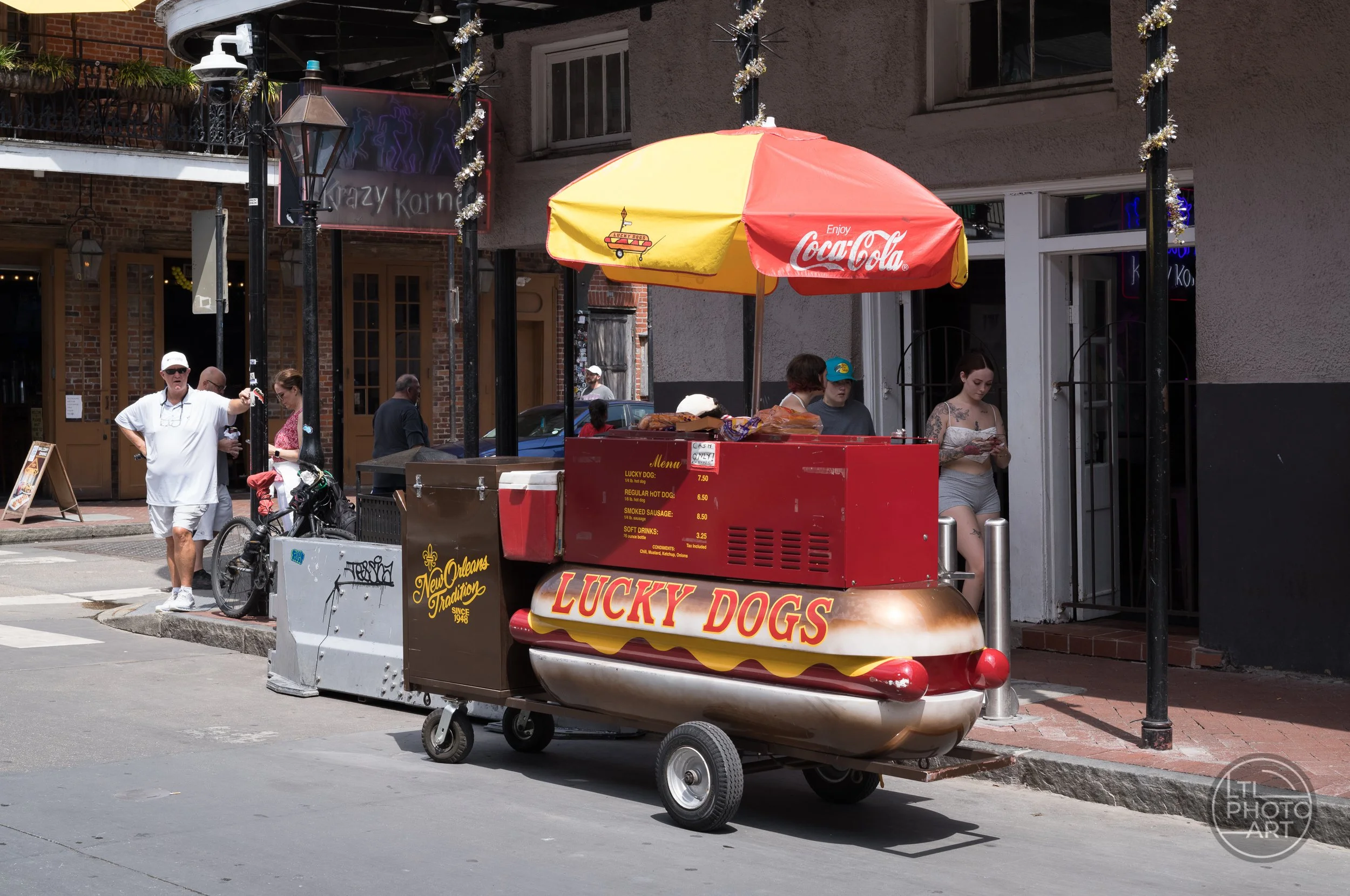 Lucky Dogs hot dog cart near Bourbon and St. Peter Streets in the French Quarter of New Orleans.