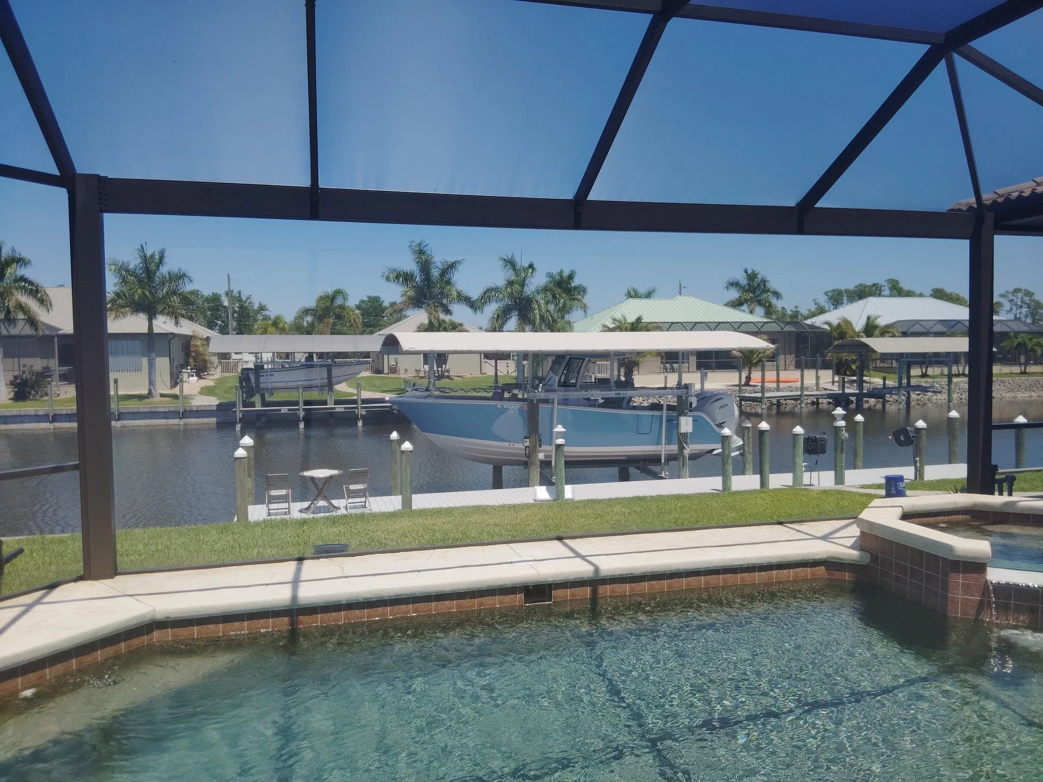 Panoramic pool cage screen enclosure with unobstructed view, Florida