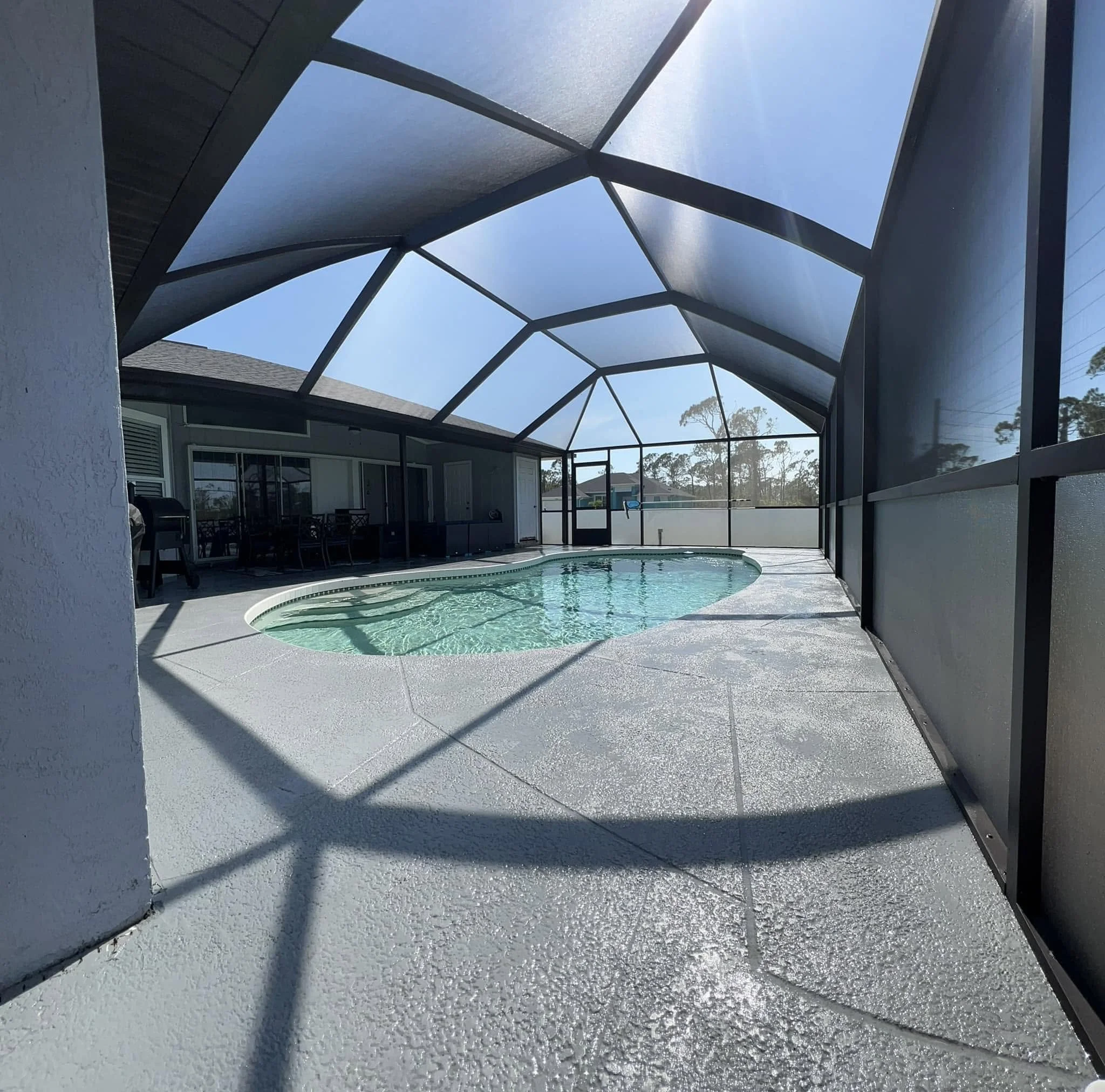 Complete pool cage restoration with full rescreening and stainless-steel screw replacement.