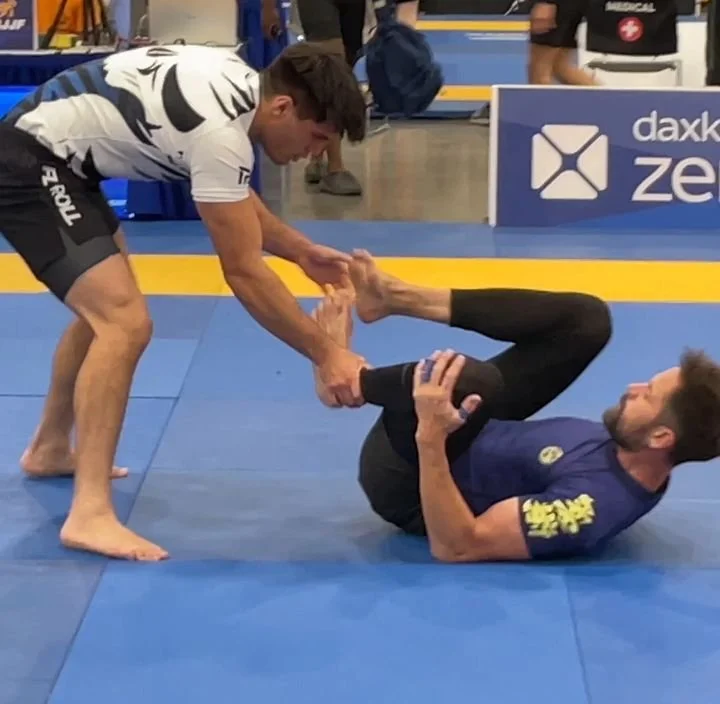 Got a chance to compete in the Jiu-Jitsu Con NoGi Adult Division (18 to 29 years old) in Vegas with competitors that are half my age and with 6-minute rounds versus five. I didn't get very far but it was definitely an awesome experience and would do 