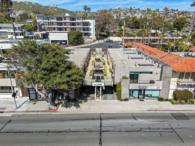 14 Studio Units + Retail