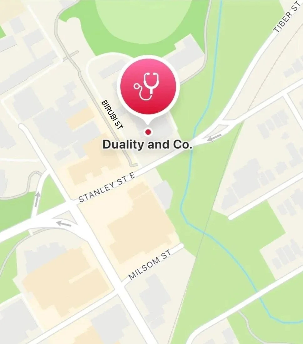 Map showing the location of a medical practice called Duality and Co., marked with a red icon featuring a stethoscope. The practice is situated on Birubi Street near Stanley Street East, Milsom Street, and close to a green park area.