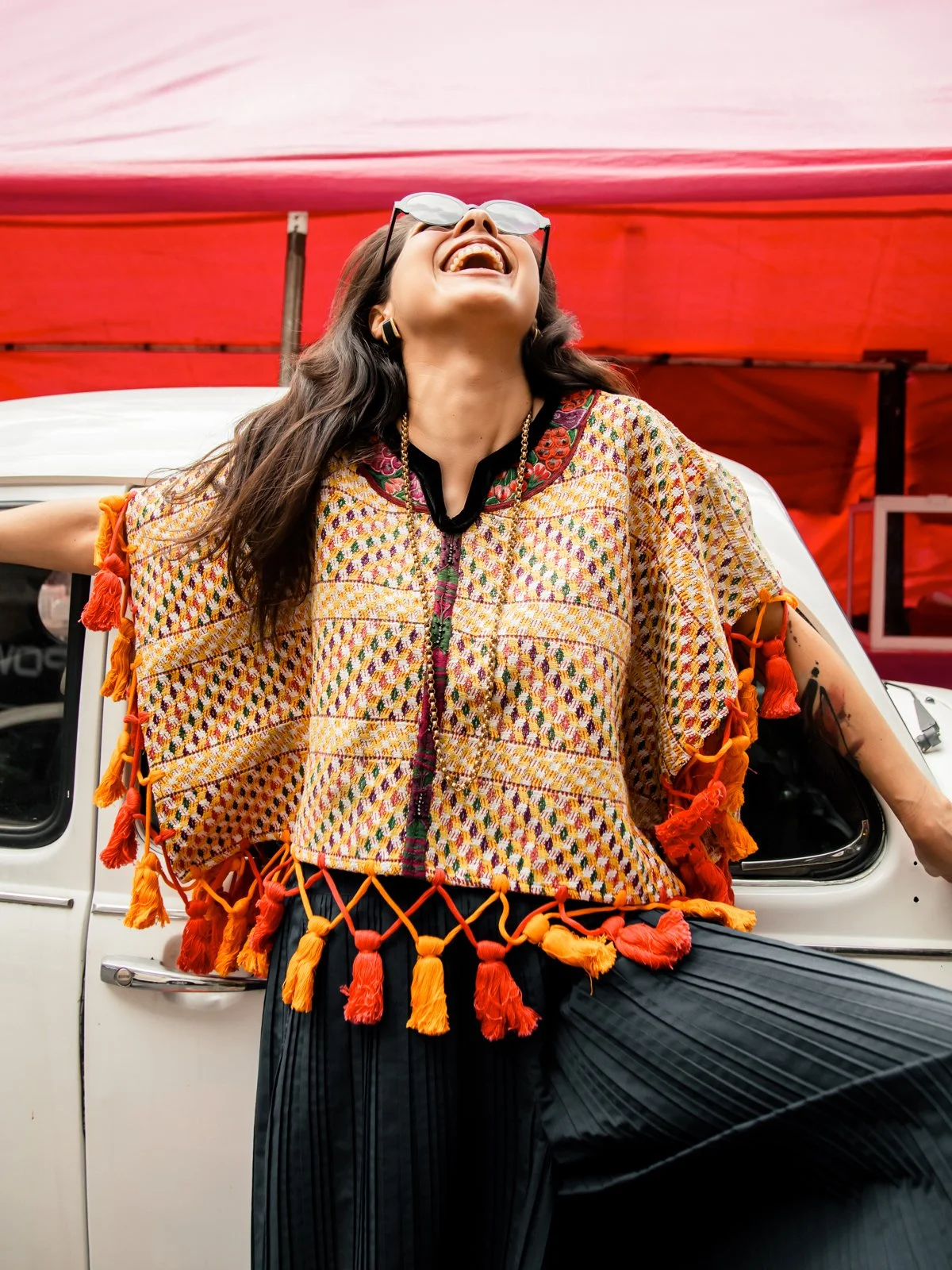dos-olmecas-handwoven-mexican-cape-cuello-poncho-yellow-pink-closeup.jpg
