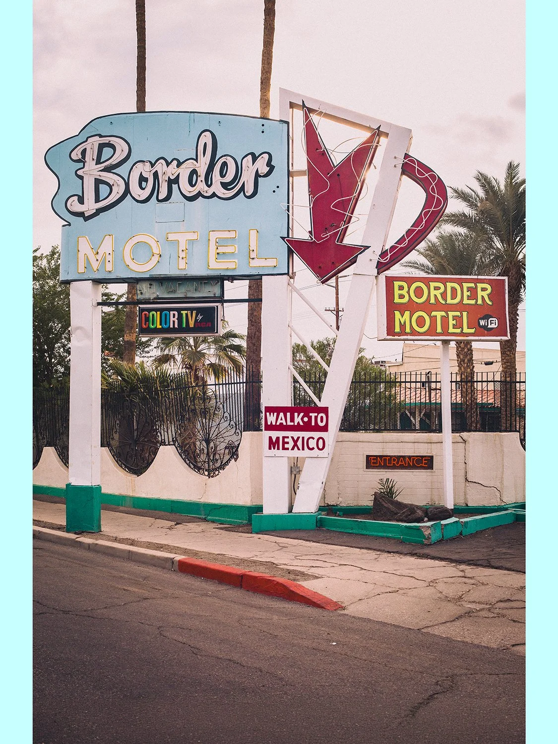 Unframed 12x18 fine art photography print of the vintage retro neon Border Motel sign in Calexico, showing the vibrant colors on premium matte paper.