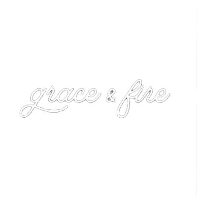 The image features the words "grace & fire" written in white cursive text on a black background.