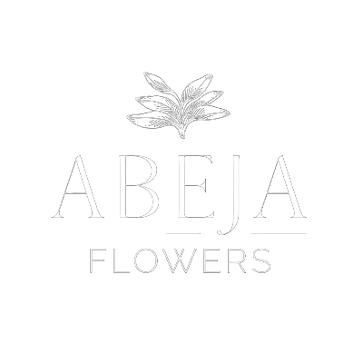 Logo for Abeja Flowers featuring a stylized white flower illustration above the text 'ABEJA' and 'FLOWERS' on a black background.