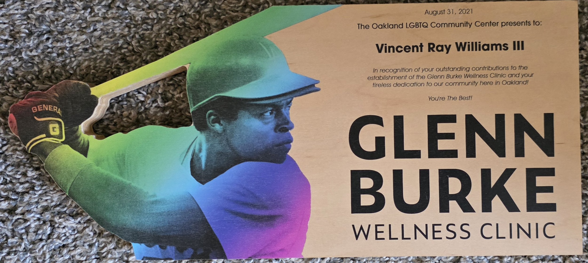 Colorful flyer featuring a portrait of a young man in a baseball helmet and gloves, holding a bat, promoting the Oakland LGBTQ Community Center and honoring Vincent Ray Williams III, dated August 31, 2021.