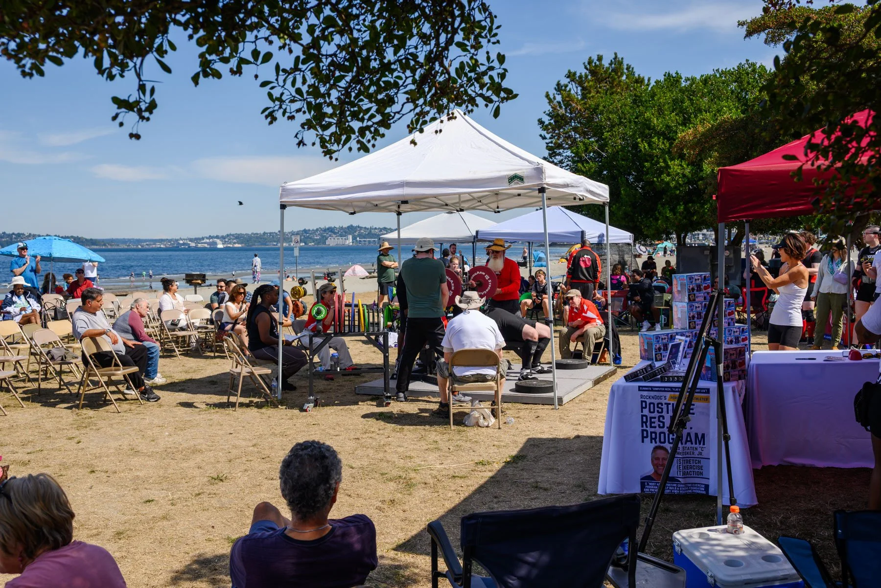 View of Alki Beach powerlifting tournament with puget sound in the distance
