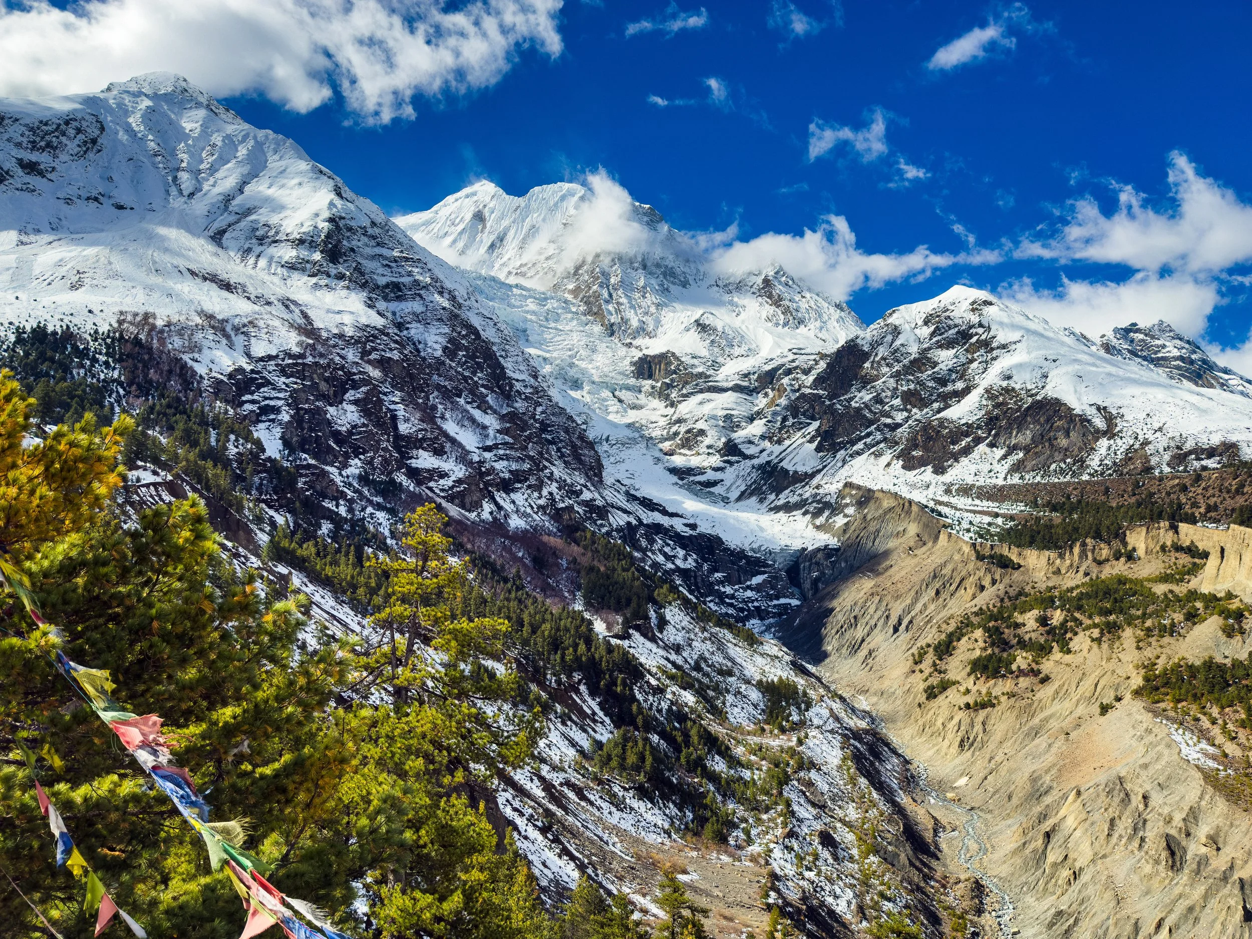 Views of Mt. Gangapurna and Khangsar Kang, as seen from Gangapurna View Point, also known as Chongkar view point of Manang. A part of the acclimatization day hike we participate from Manang enroute Annapurna Circuit Trek, April 2026
