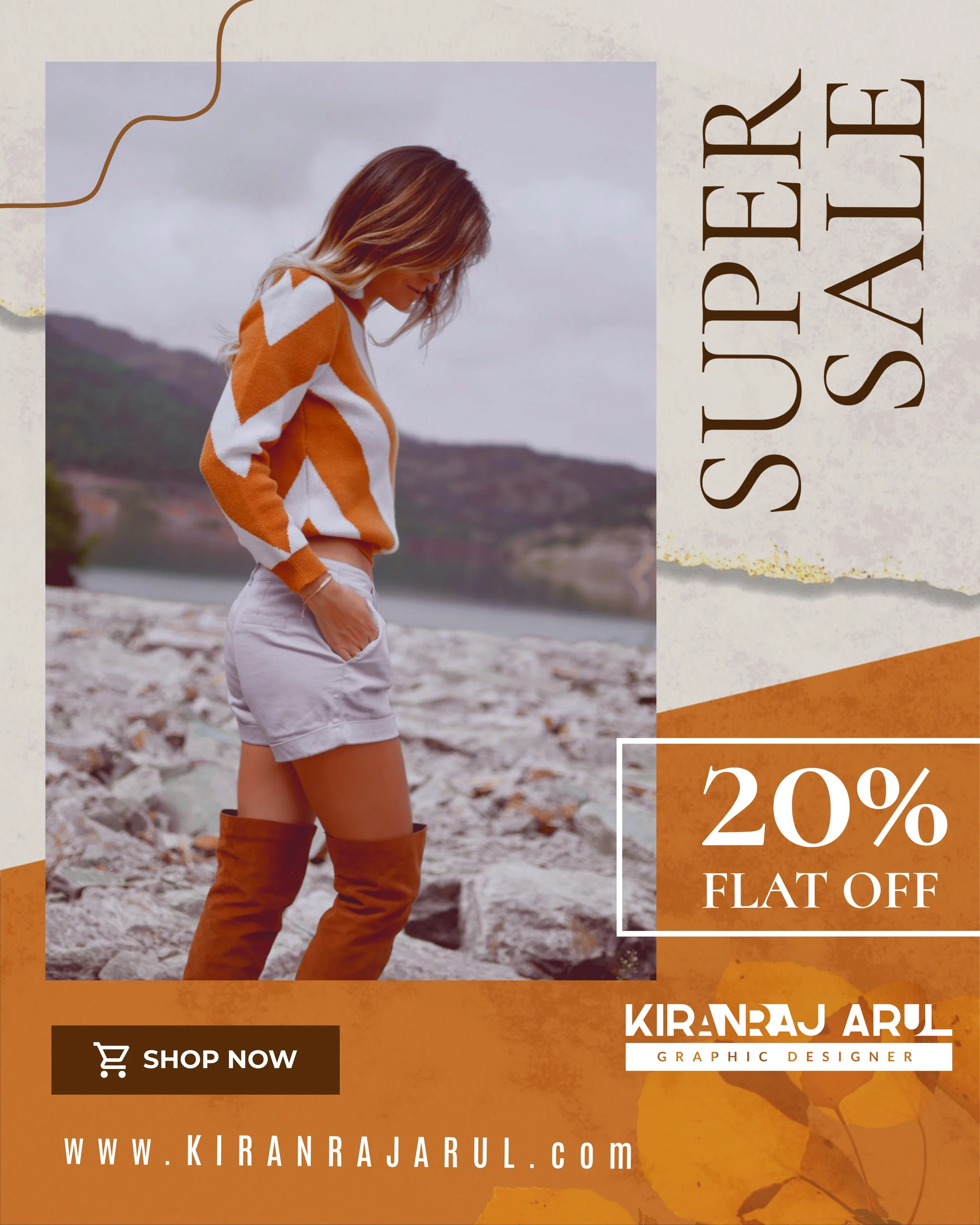 A designer with long, wavy hair standing outdoors on rocky terrain near water and mountains, wearing a orange and white sweater, beige shorts, and thigh-high orange boots, in an overcast setting with promotional text and website for Kiranjaraul.