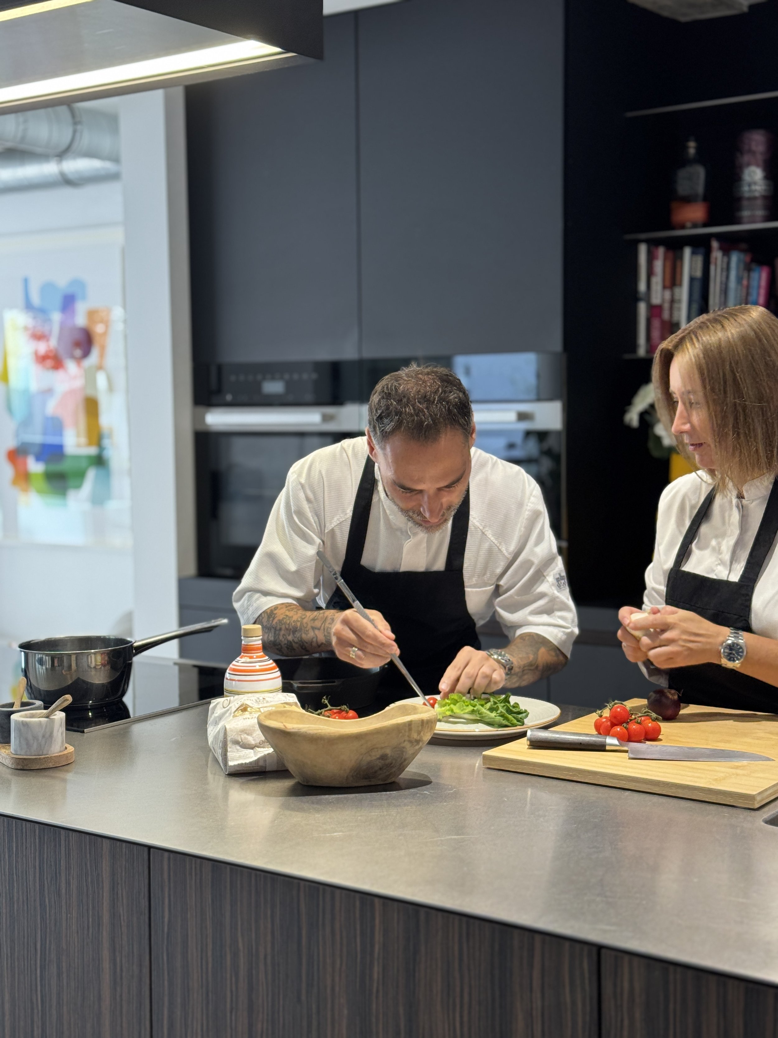 Vanessa & Carlo preparing a bespoke private dining experience together.