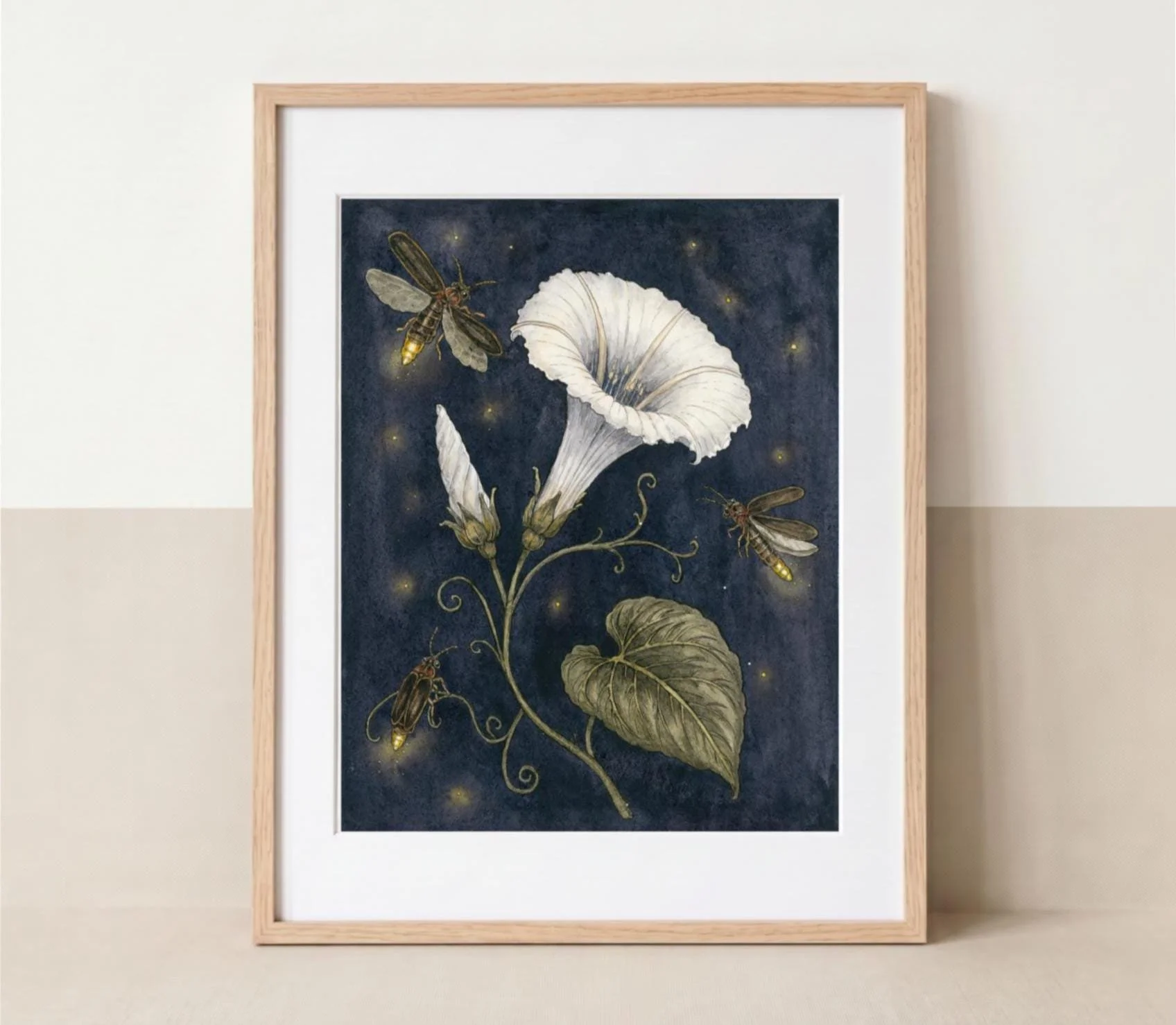 Moonflower and Fireflies botanical art print, featuring a luminous white flower, green vine and glowing fireflies against a deep midnight-blue background.