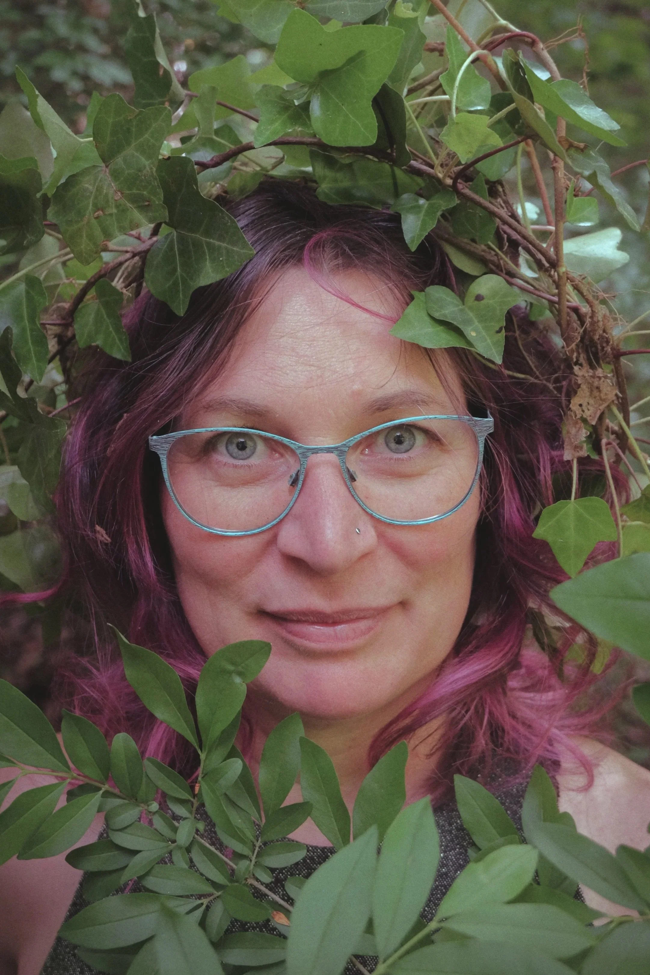 therapist enshrouded in leaves