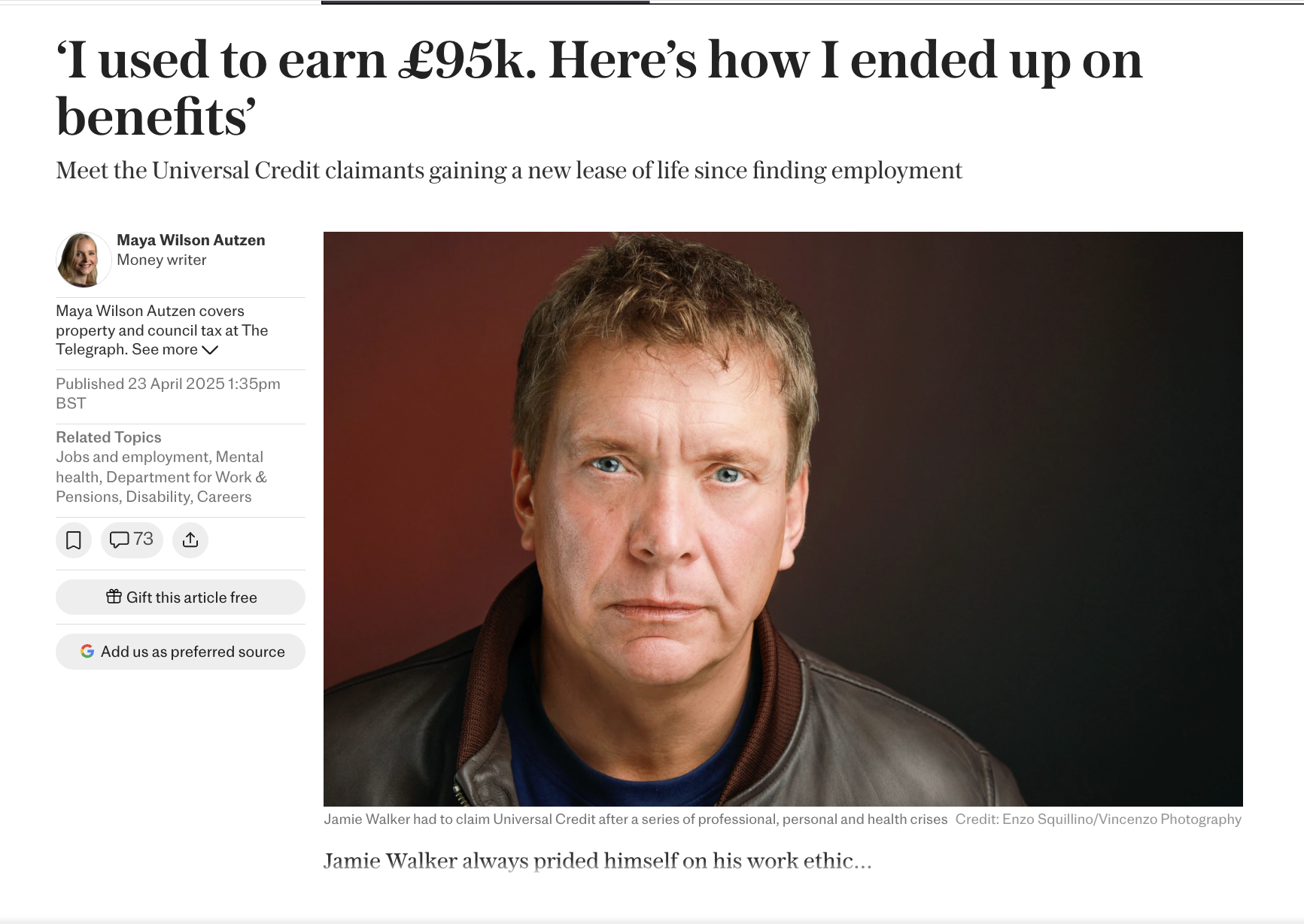 Close-up photo of a middle-aged man with short, light brown hair, wearing a leather jacket over a dark shirt, neutral expression, against a dark background.