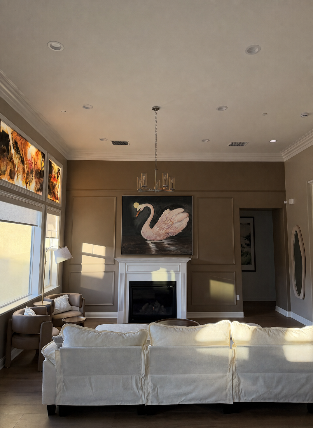 Swan painting on wall above fireplace-2.png