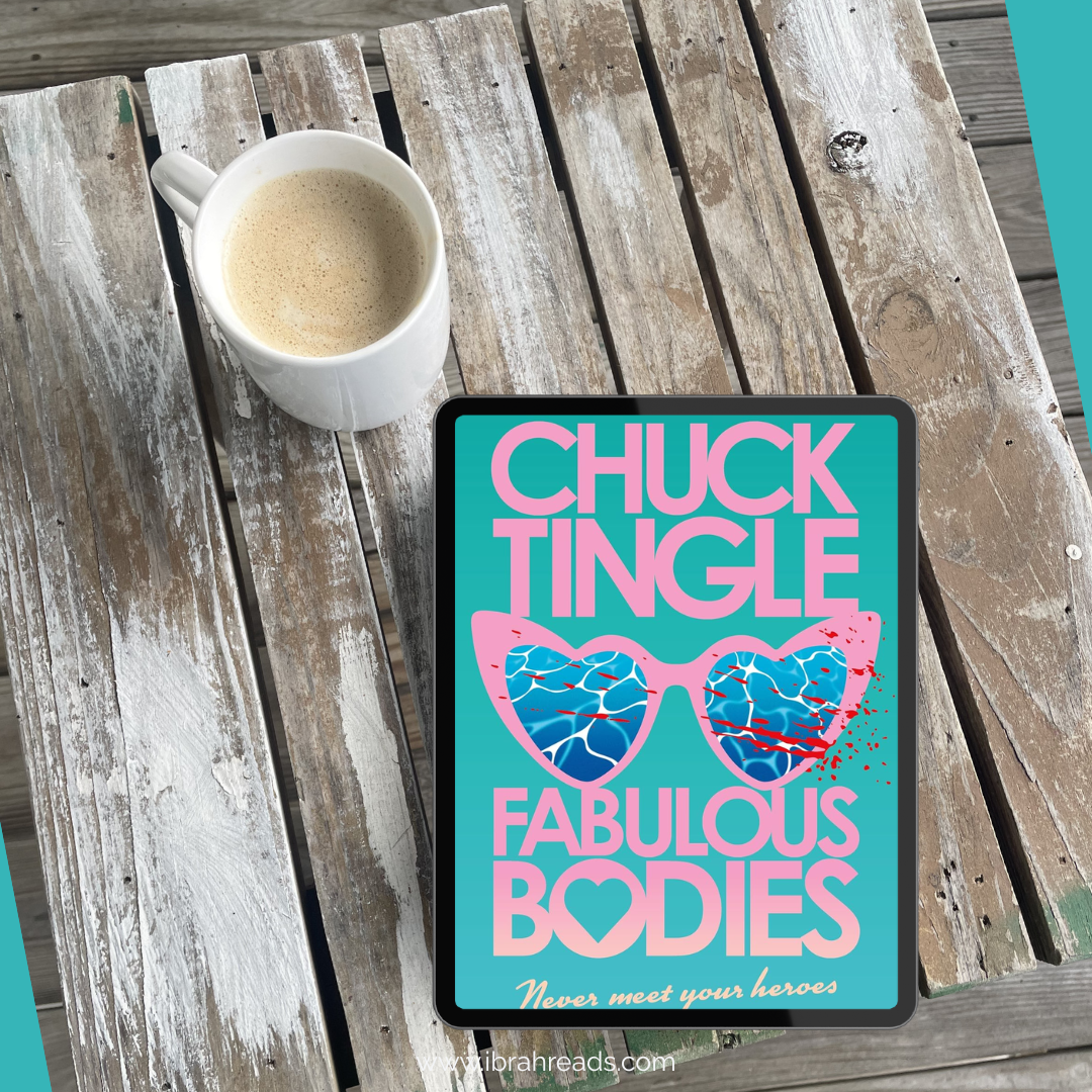 Weathered wooden table holds a latte in a white mug and an iPad with the book Fabulous Bodies by Chuck Tingle on the screen.