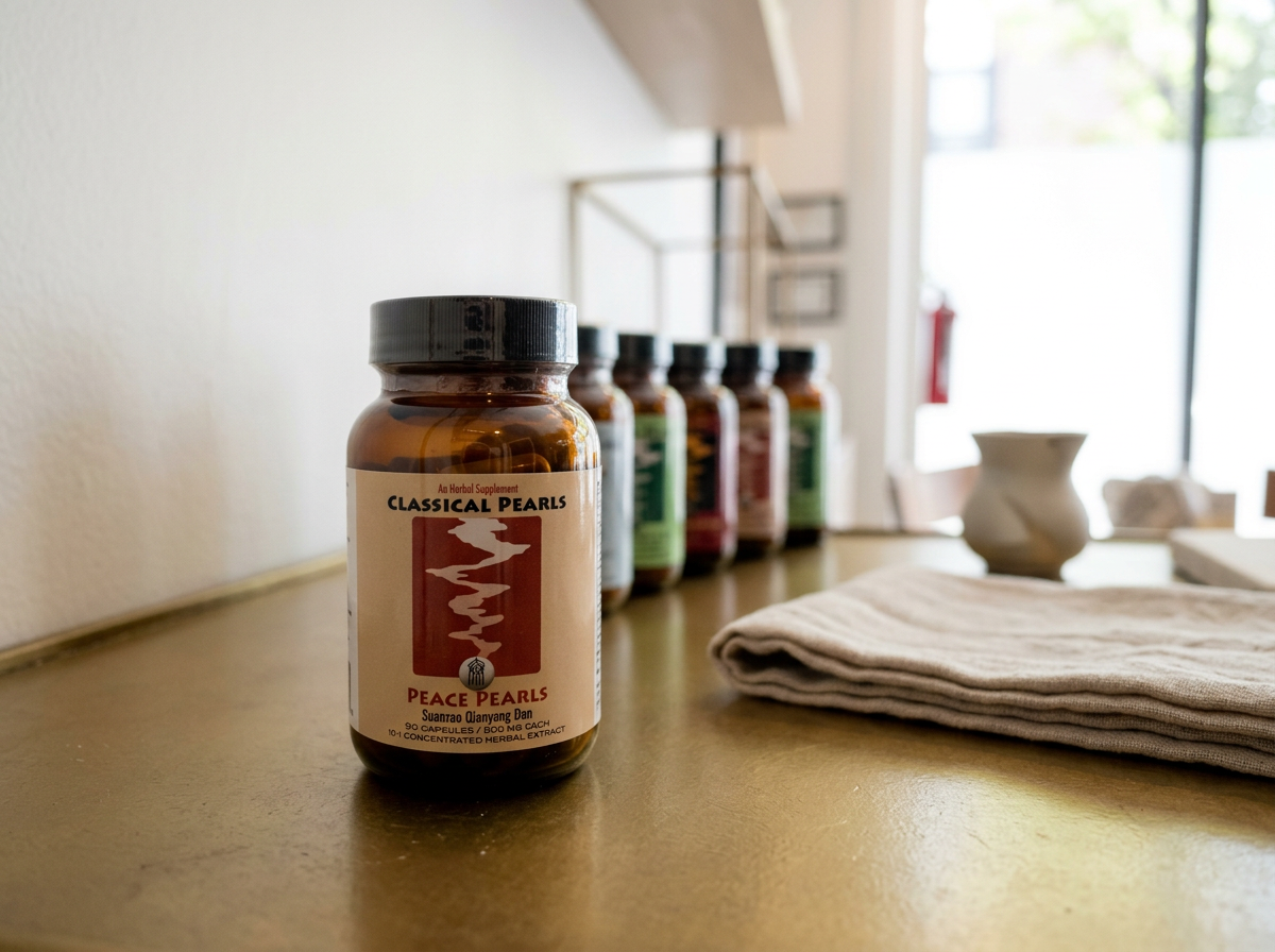 Bottle labeled 'Peace Pearls' herbal supplement on a table with folded cloth and pottery in the background.