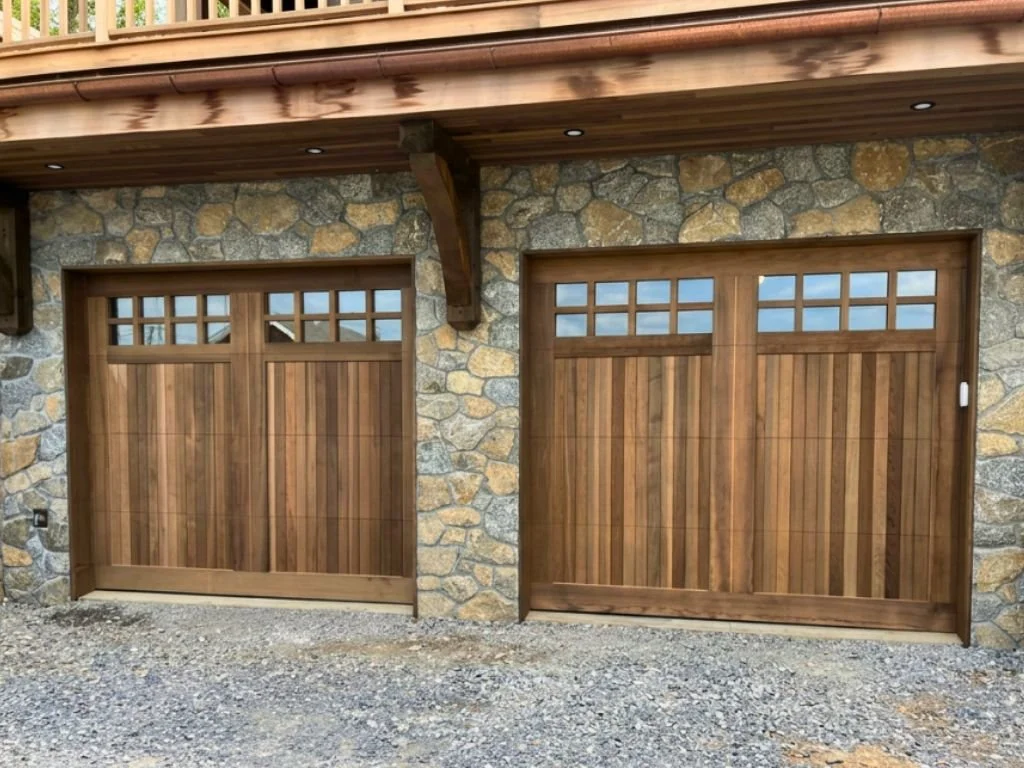 Custom wood carriage house garage doors installed in Saratoga Springs, NY