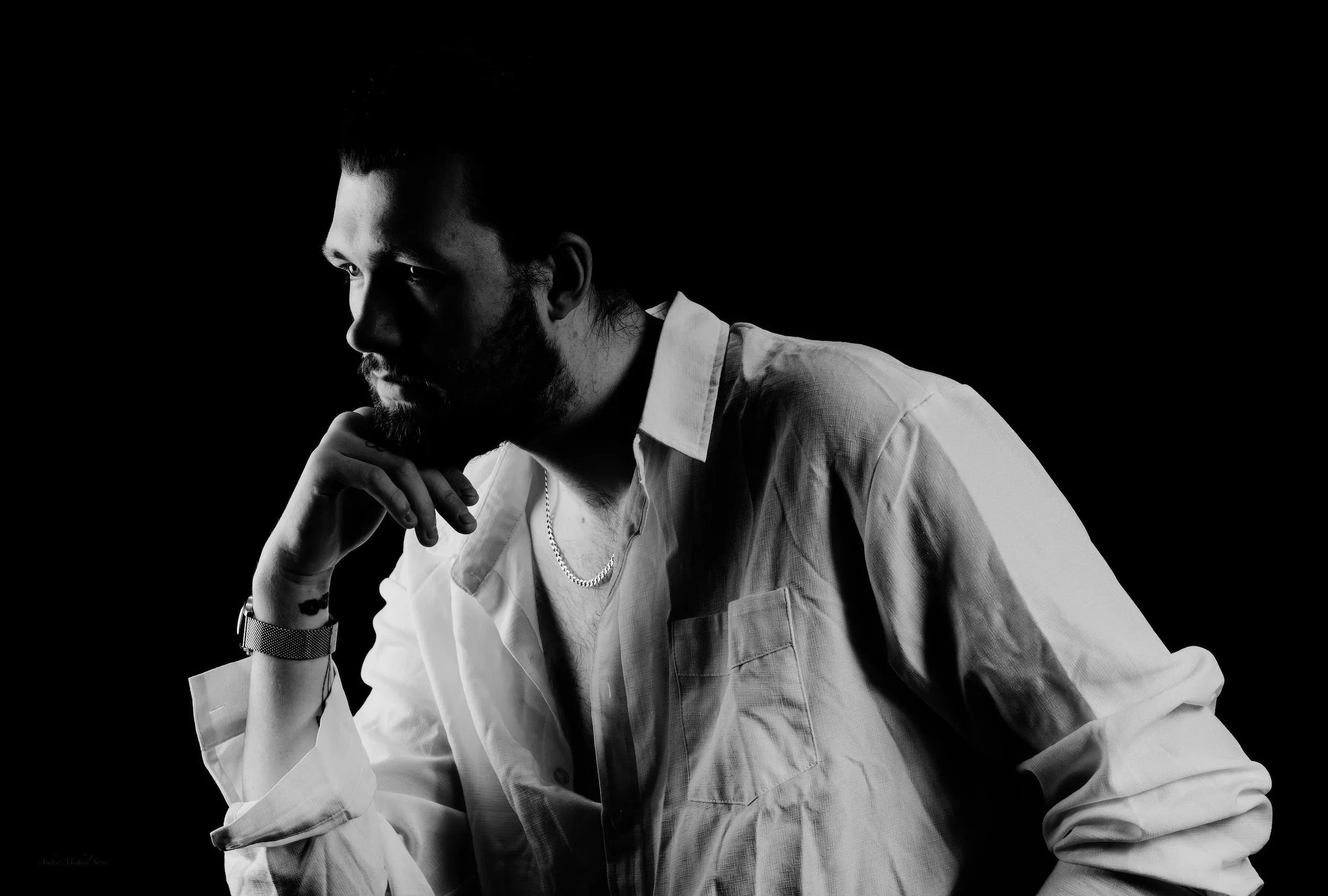 Black & White Male Portraiture on black background shot in studio .jpg