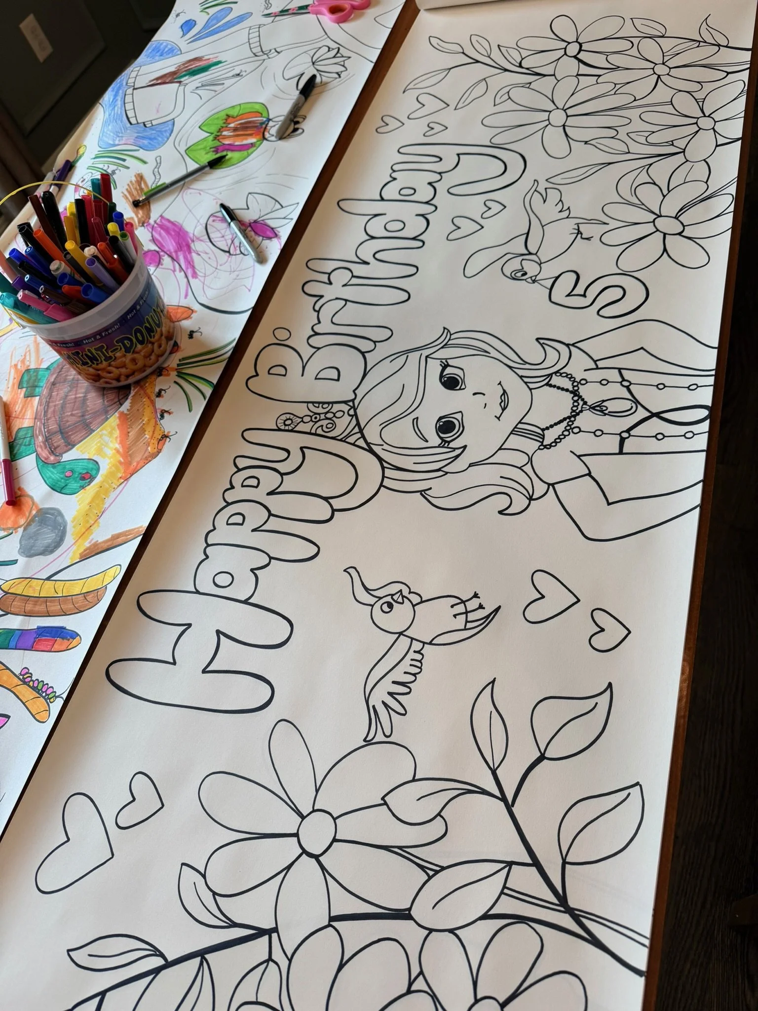 Pages of coloring sheets with outlines of a girl with long hair adorned with jewelry, surrounded by flowers, leaves, a bird, hearts, and the words 'Bright & Beautiful'.