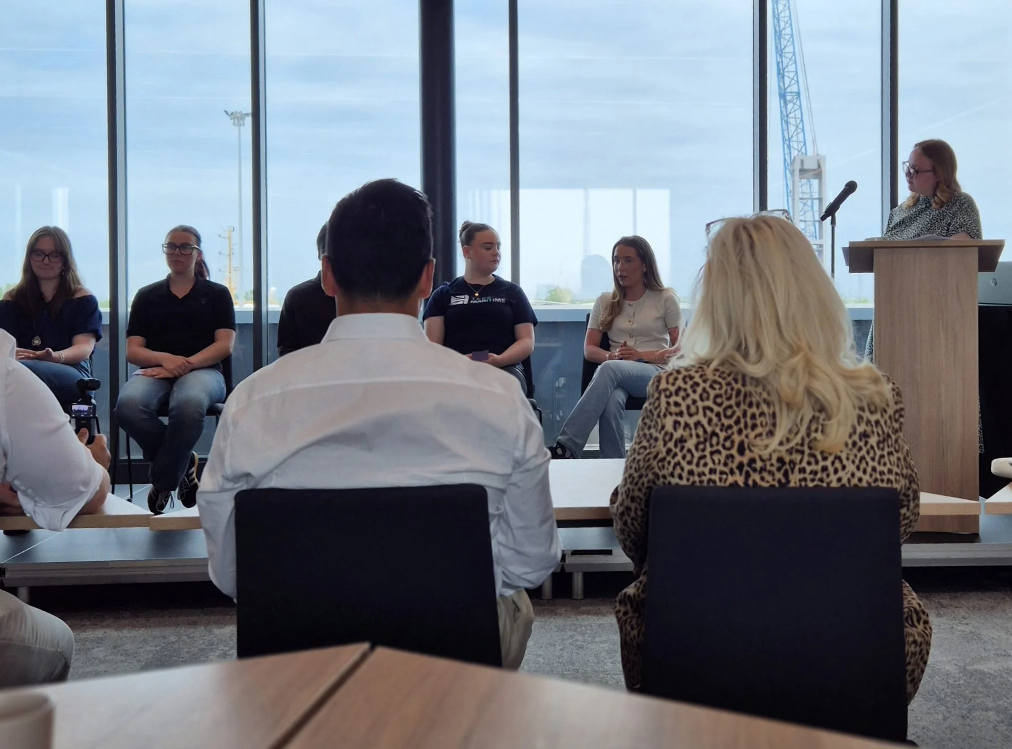 Members of the Tees Maritime Youth Board presenting their experiences and project findings to local maritime employers at an employer roundtable in Tees Valley.