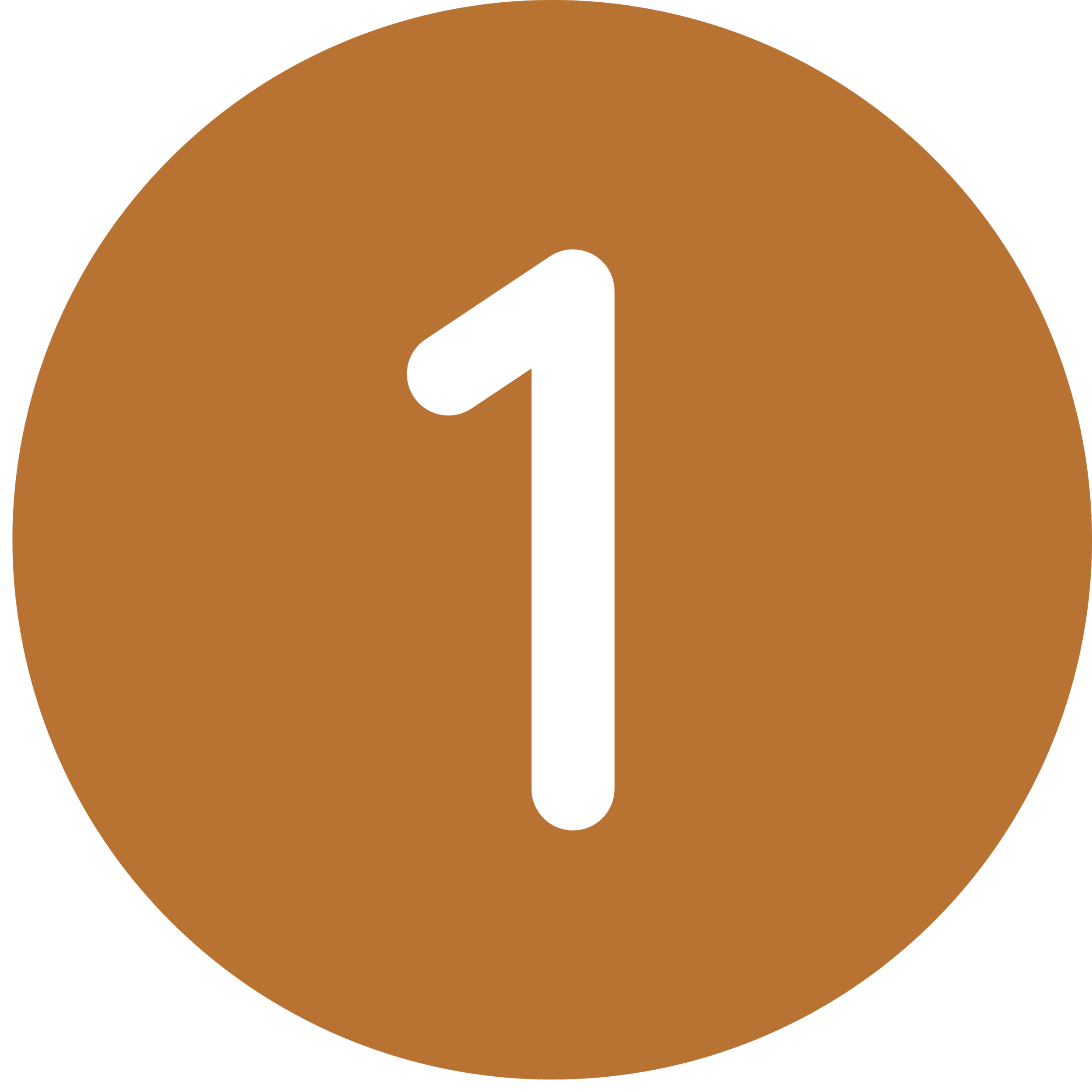 Close-up of a brown and black alarm clock with a black circular face and a small black handle on top.