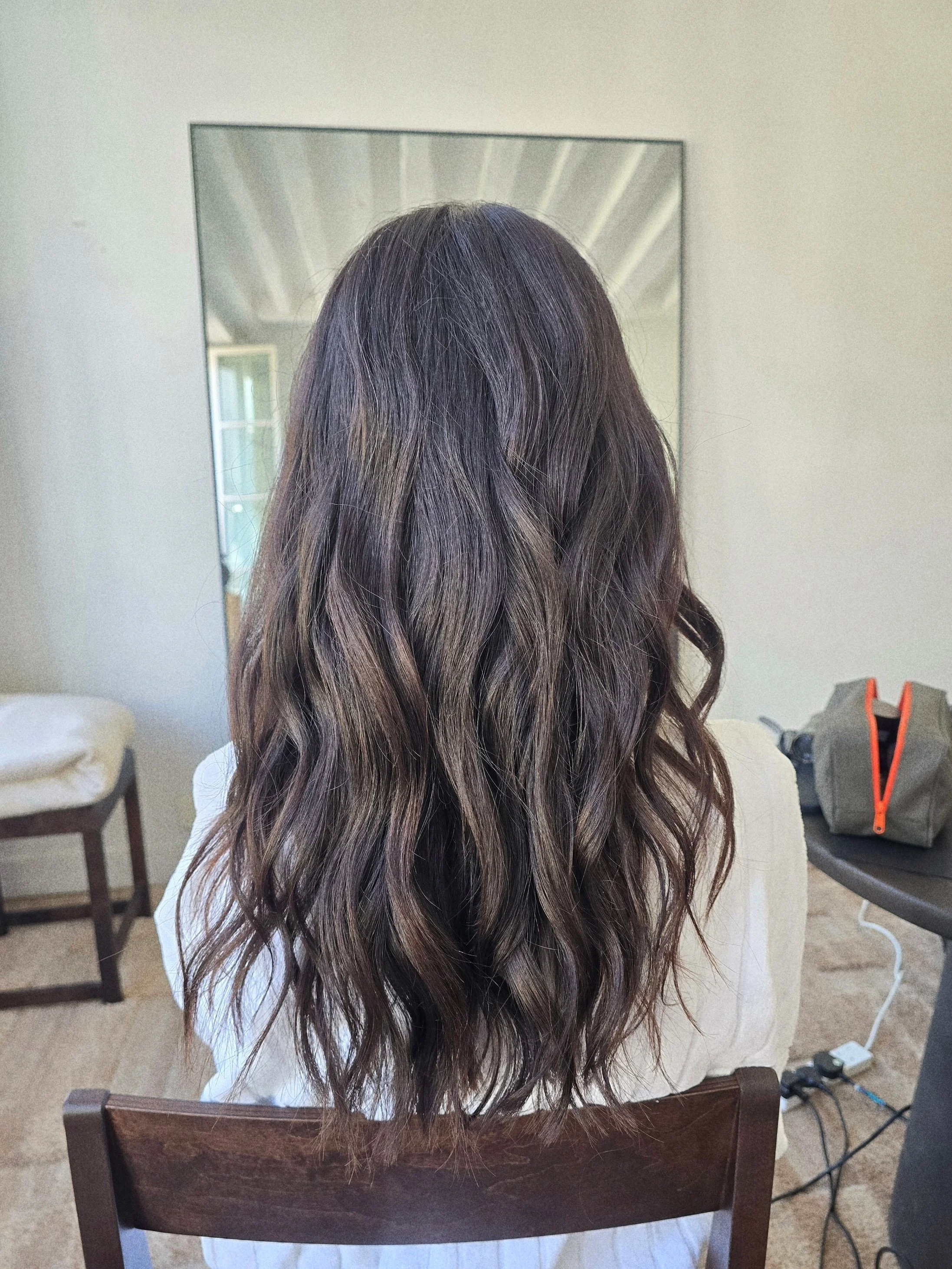 Behind-the-scenes hair styling by Sky Cripps-Jackson on a fashion shoot