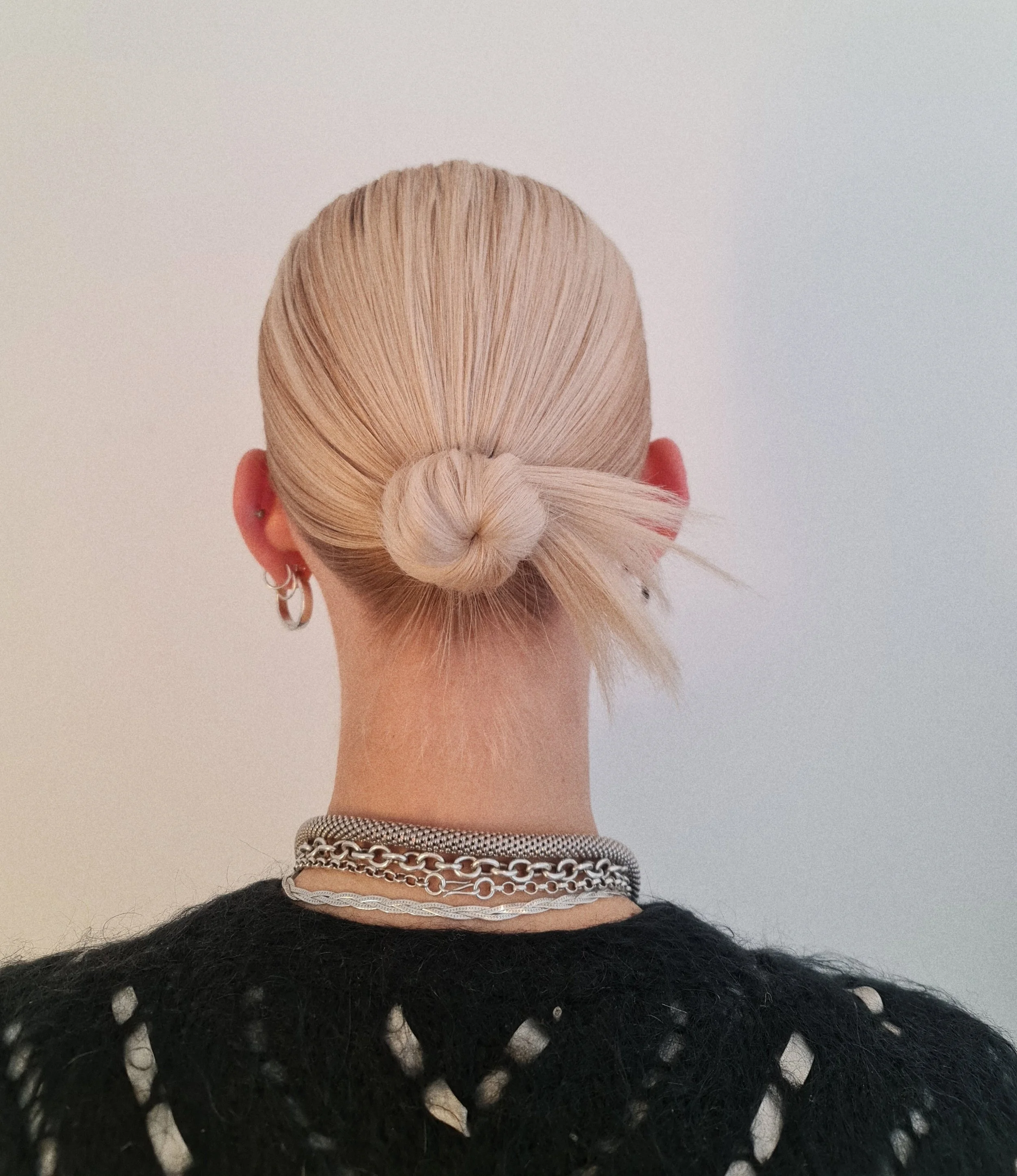Behind-the-scenes hair styling by Sky Cripps-Jackson on a fashion shoot
