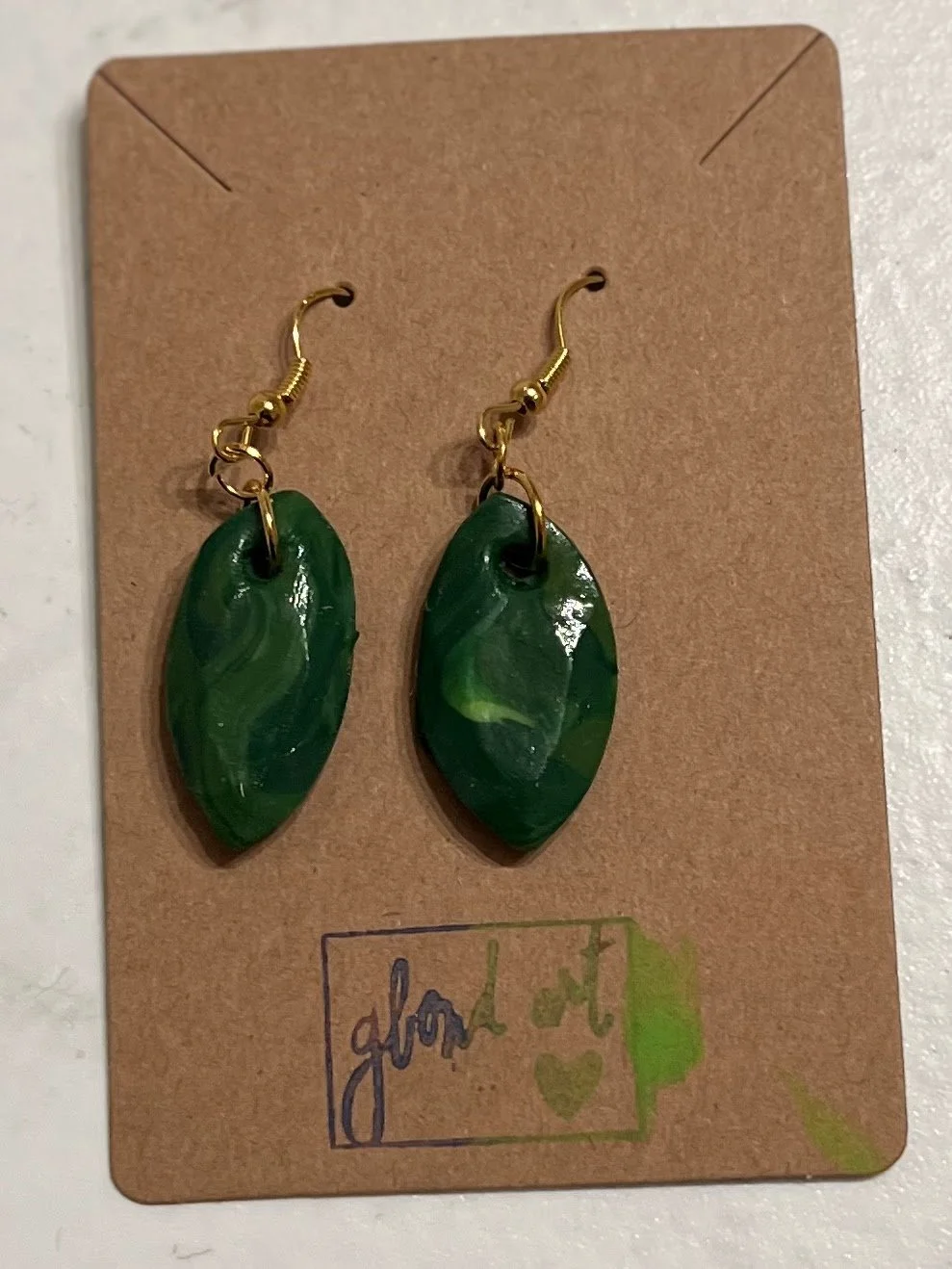 Green jewel cut dangles.jpg