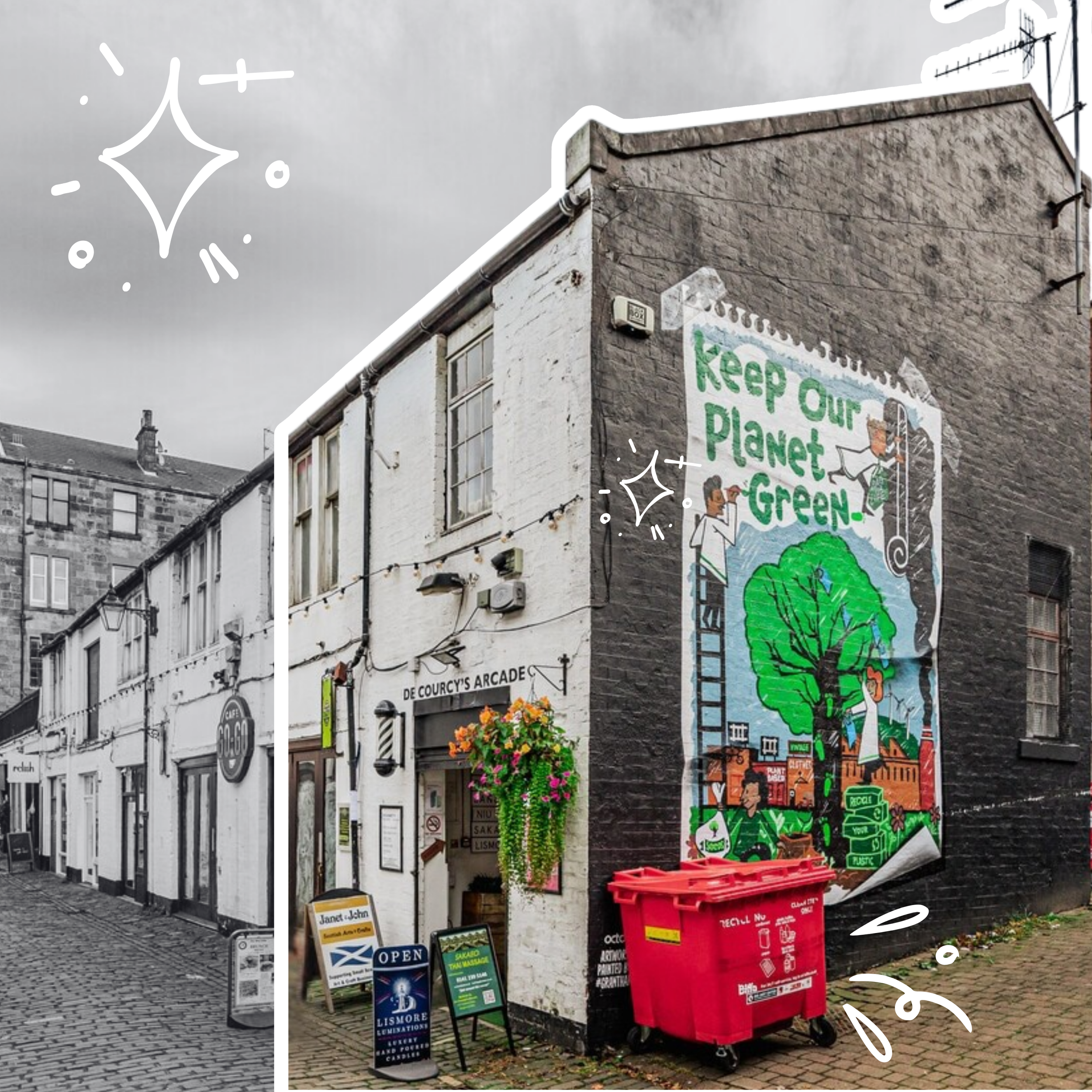 Street corner with red recycling bins, a signboard, and a mural depicting environmental themes, surrounded by old buildings and cobblestone pavement.