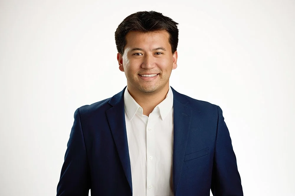 Corporate headshot in a modern office