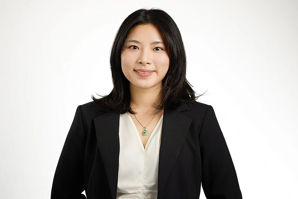 Modern corporate headshot of a professional