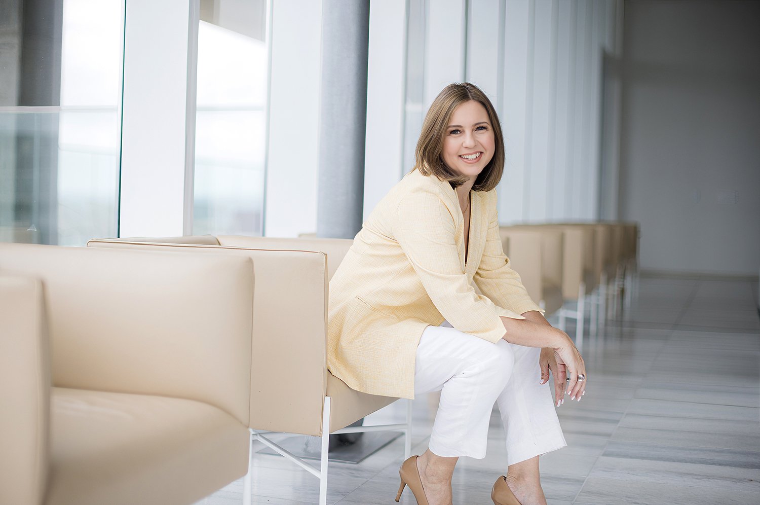 Corporate executive headshot in a modern office