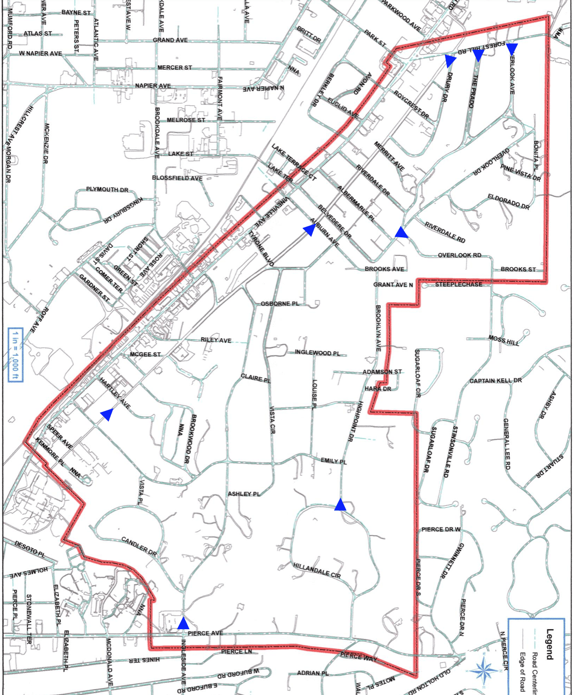 Map displaying a route marked in red, with yellow and blue arrows indicating direction at various points. The map shows streets and neighborhoods with street names. A legend is visible in the bottom right corner.