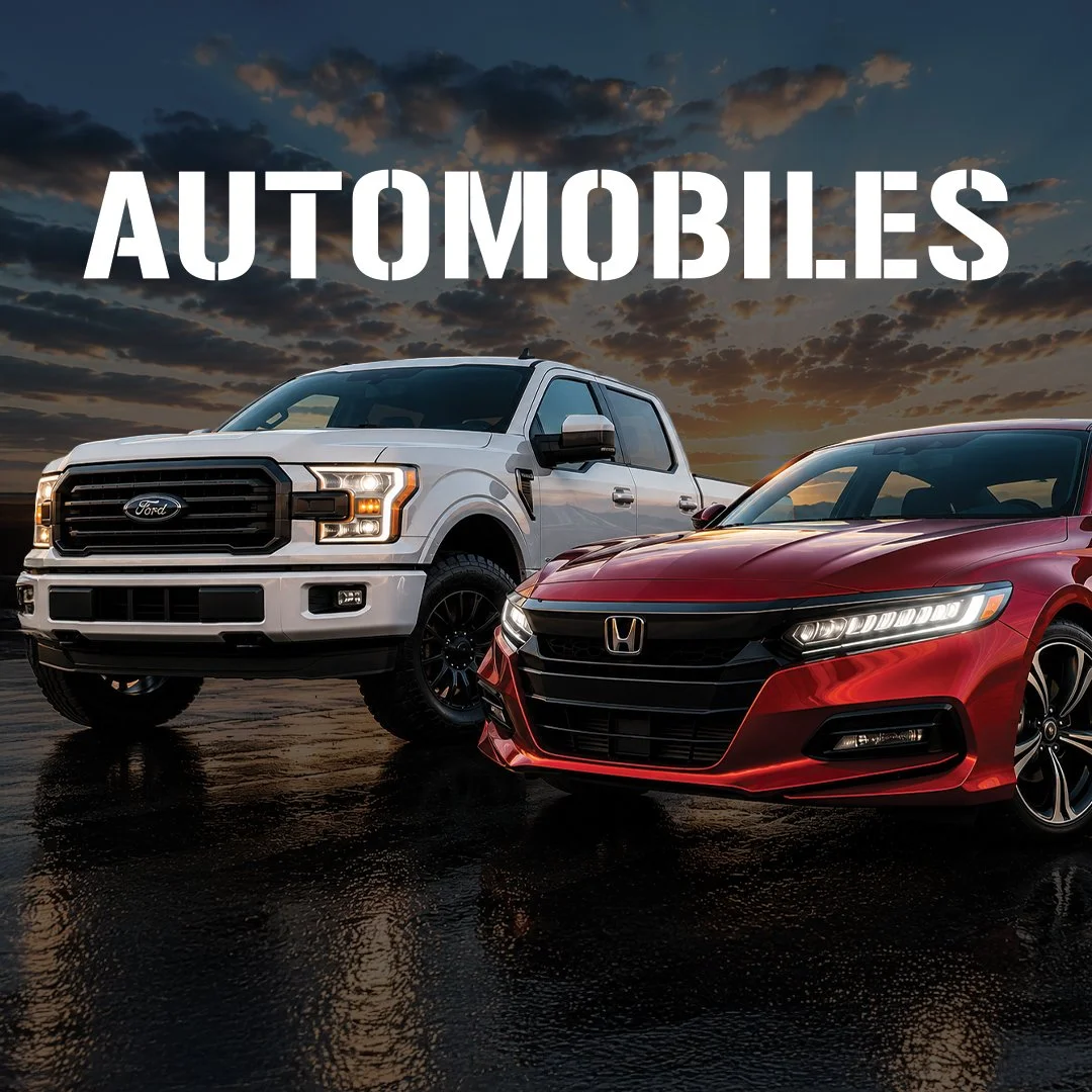 A white Ford pickup truck and a red Honda sedan parked on a wet surface during sunset, with the word 'Automobiles' overlayed at the top.