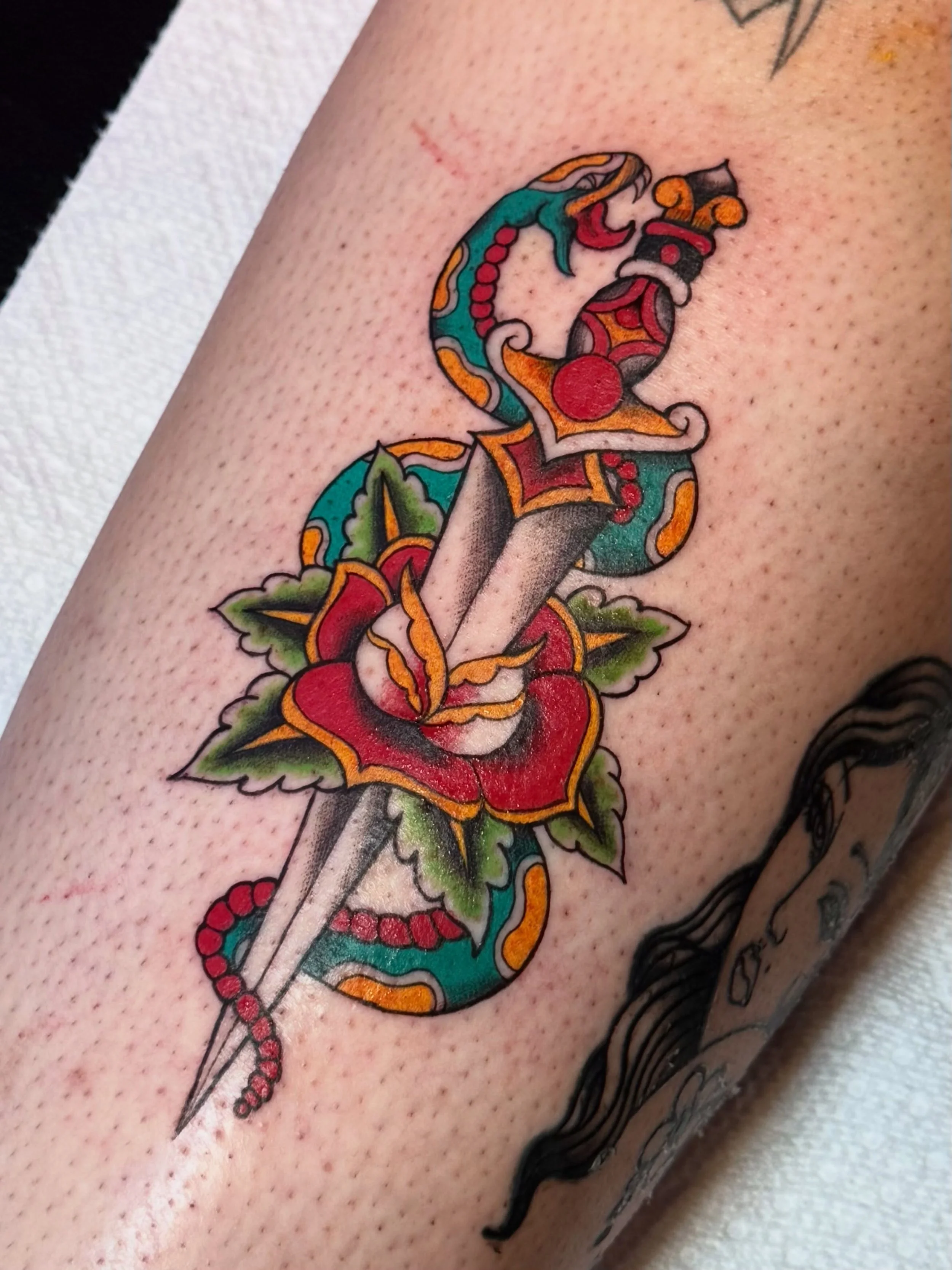 Snake and dagger off my flash 🐍 

Loving the colors on this one, thank you for sitting tough! Done at @xochi.stu 💥 message me for yours

Booking July-August 🌟

#tattoos #tattooist #dallas #dfw #texas