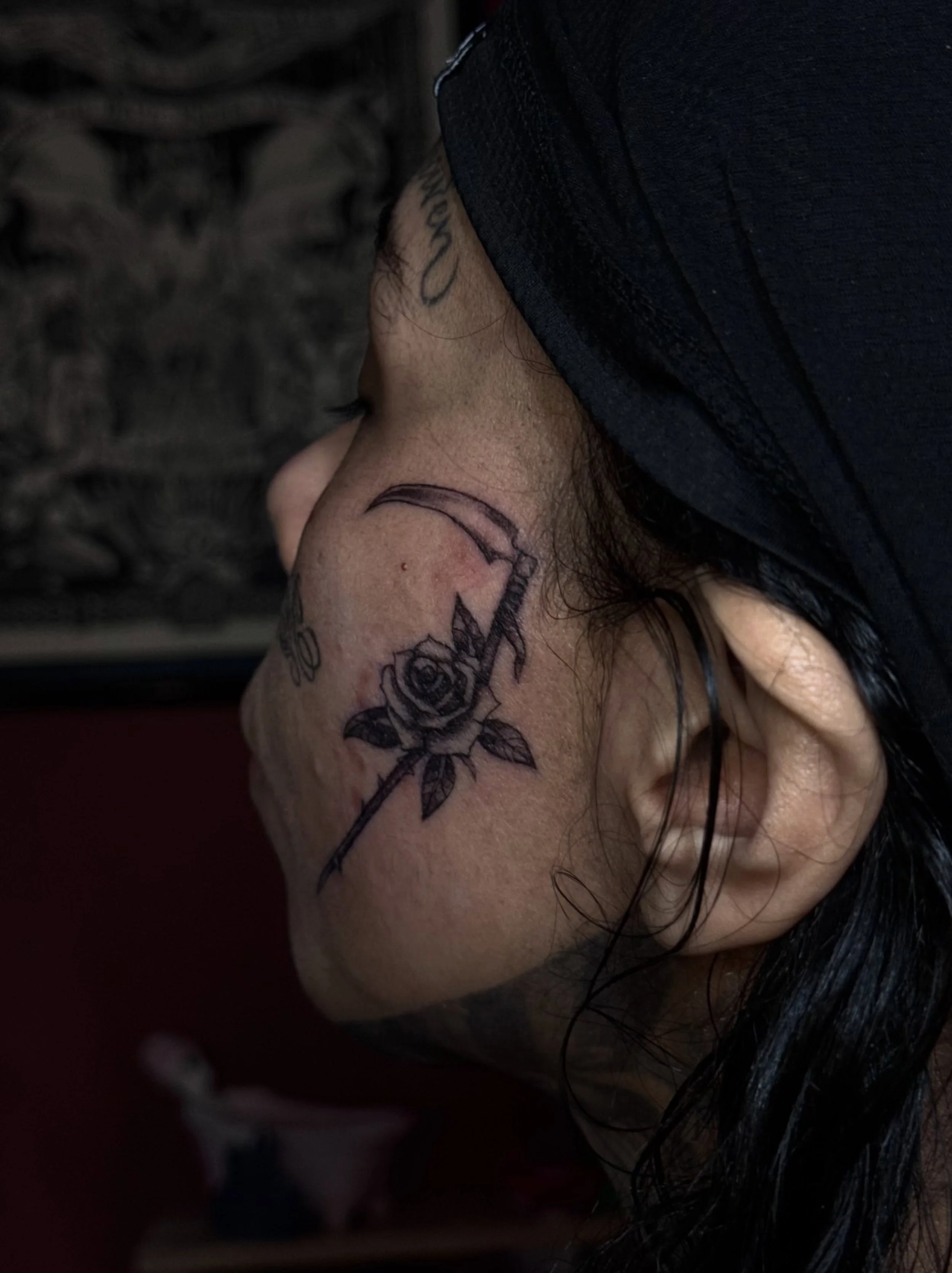 🥀🥀

Rose and scythe on the face. 
Booking November 💥 
@xochi.stu 
#tattoo #dfw #dallas
